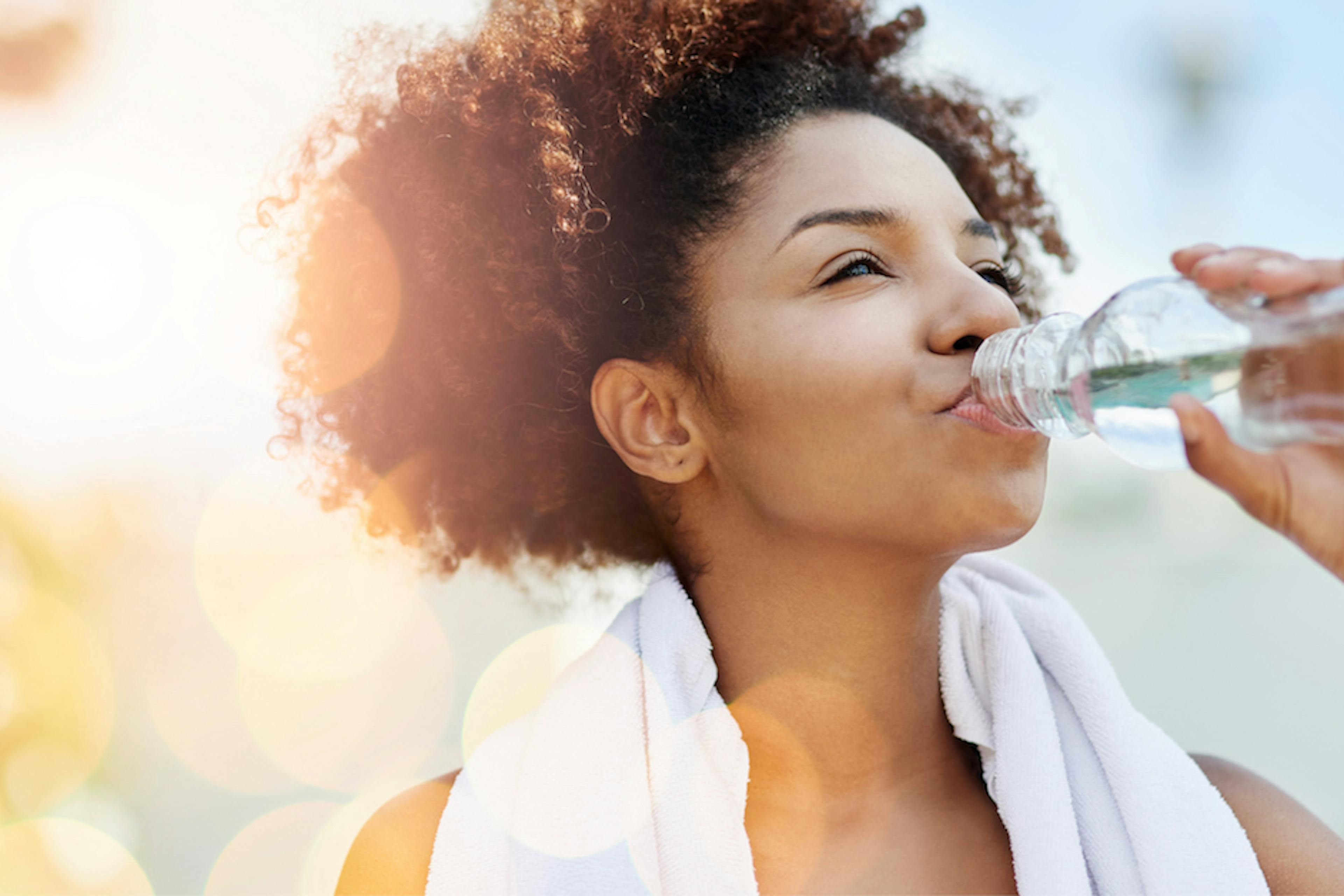 healthy woman drinking water