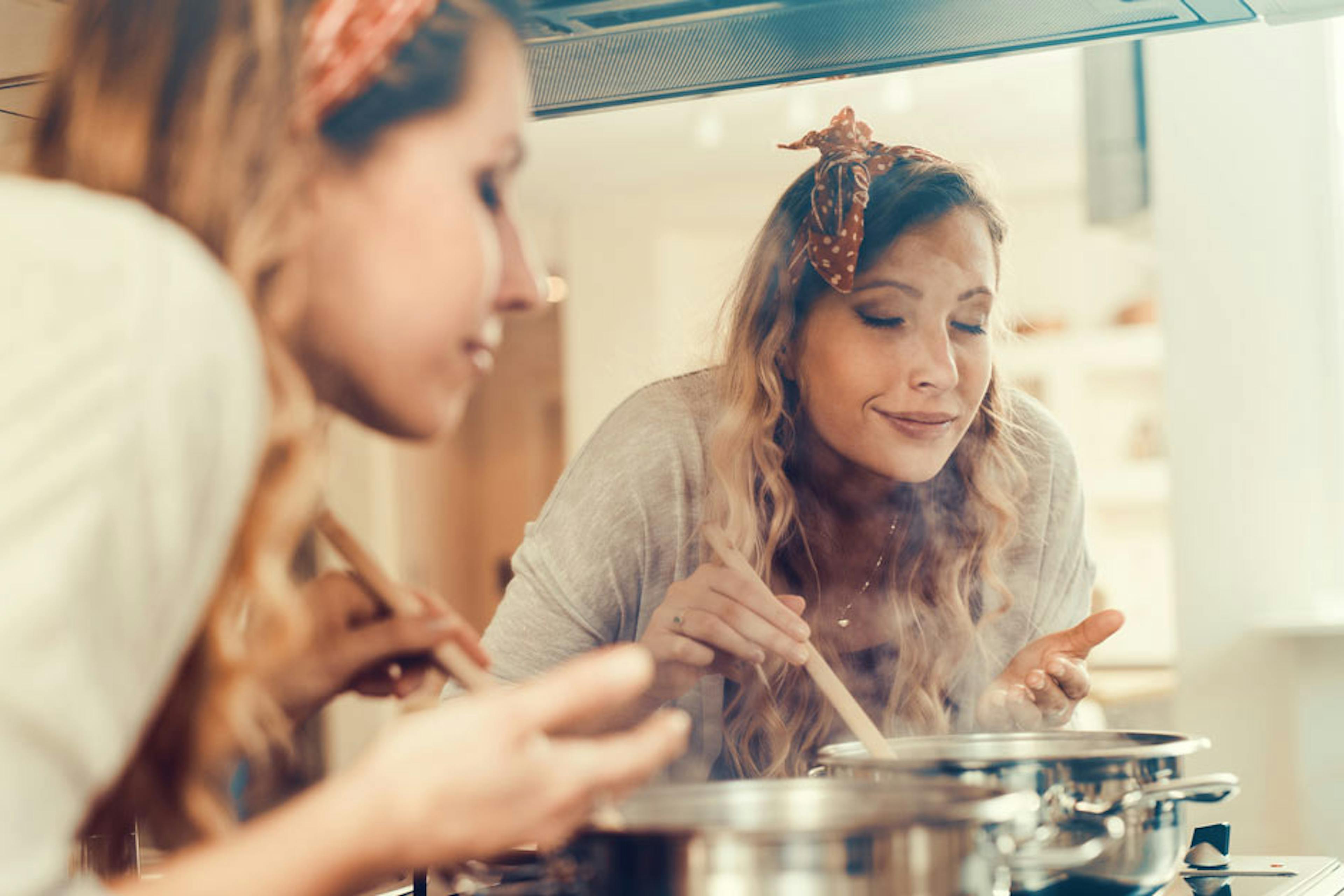 woman making soup