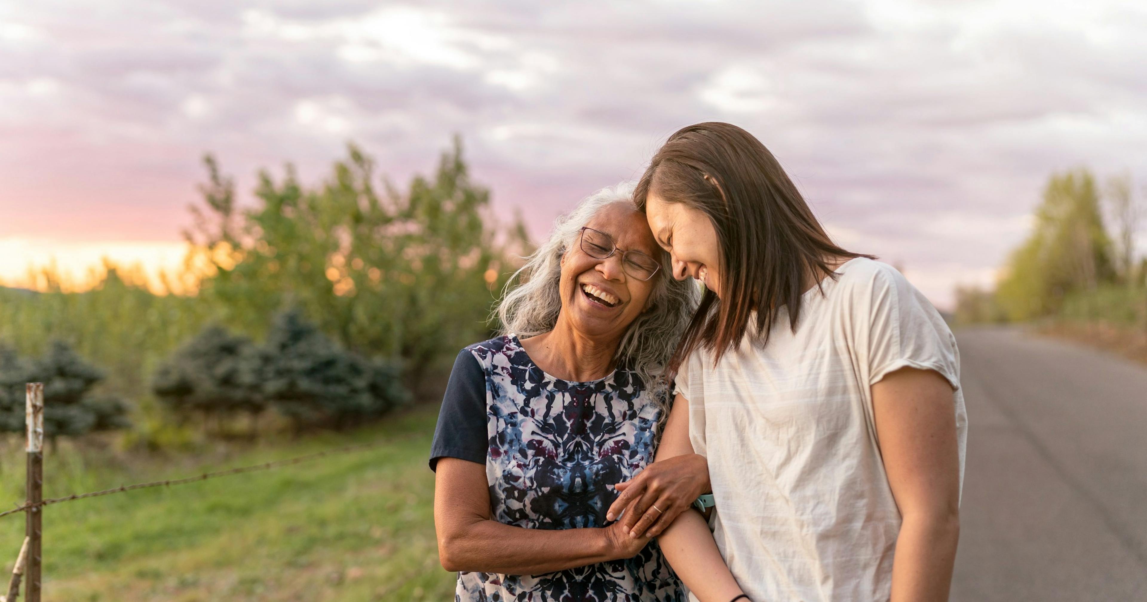 senior mom and middle age daughter