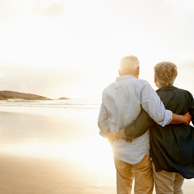 middle age couple at sunset