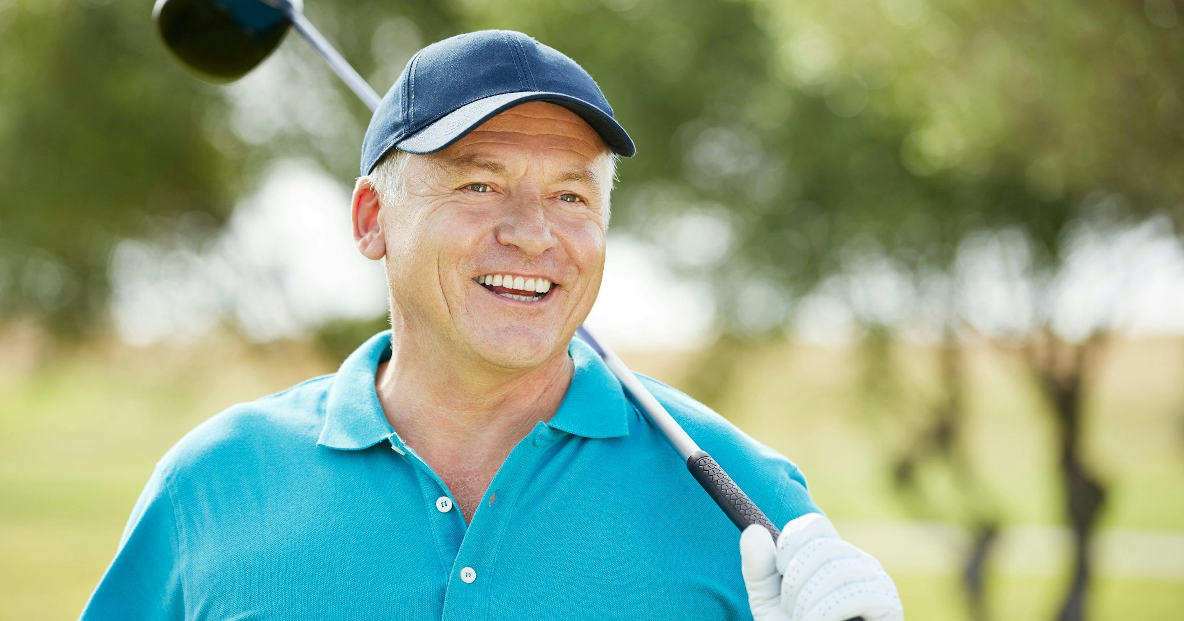 middle age man golfing