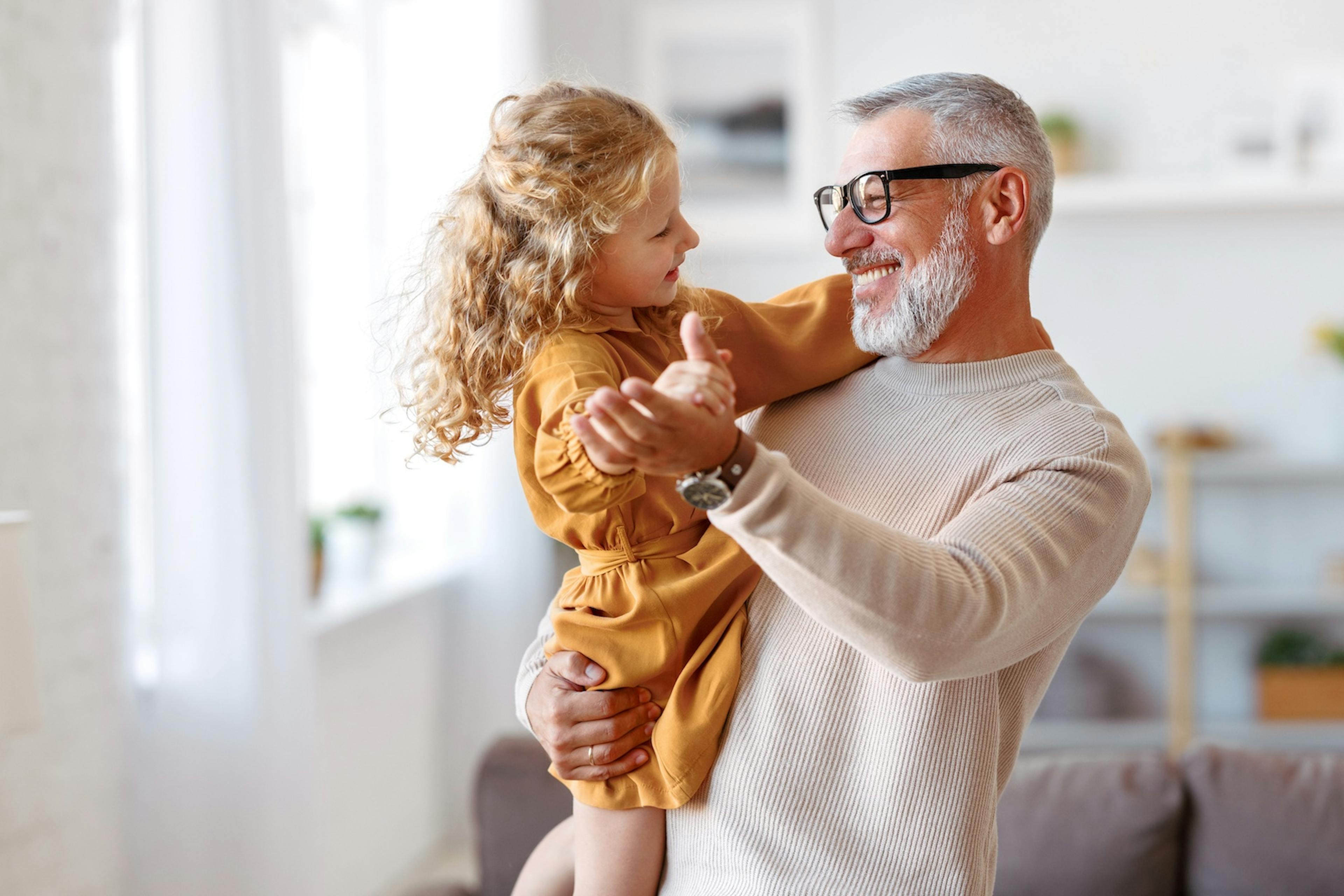 adorable granddaughter and grandpa