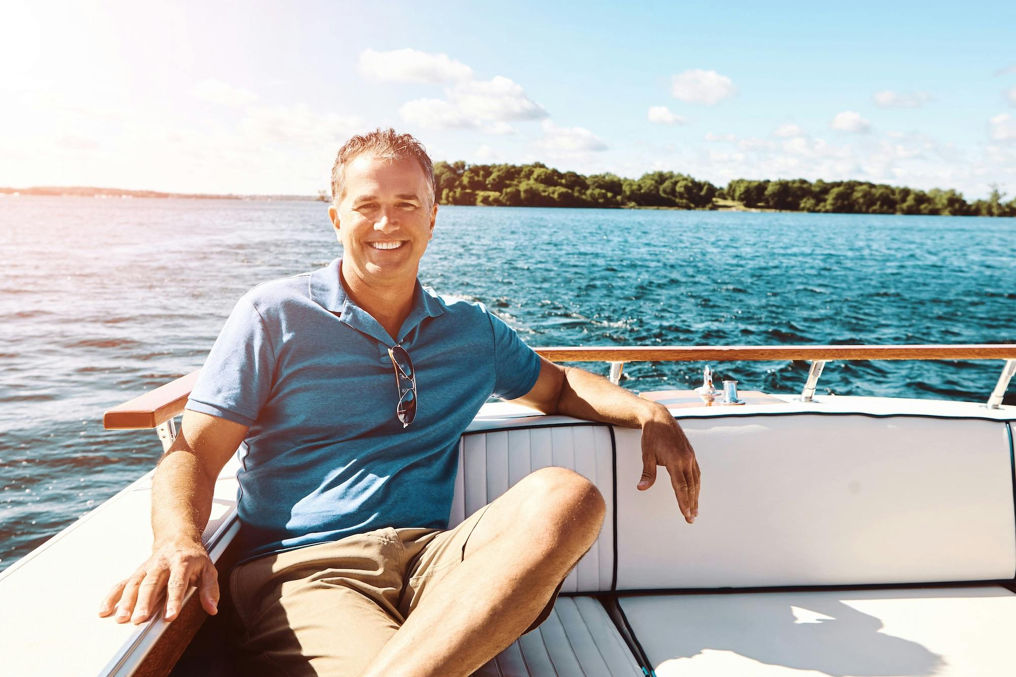 mature man outside on a boat