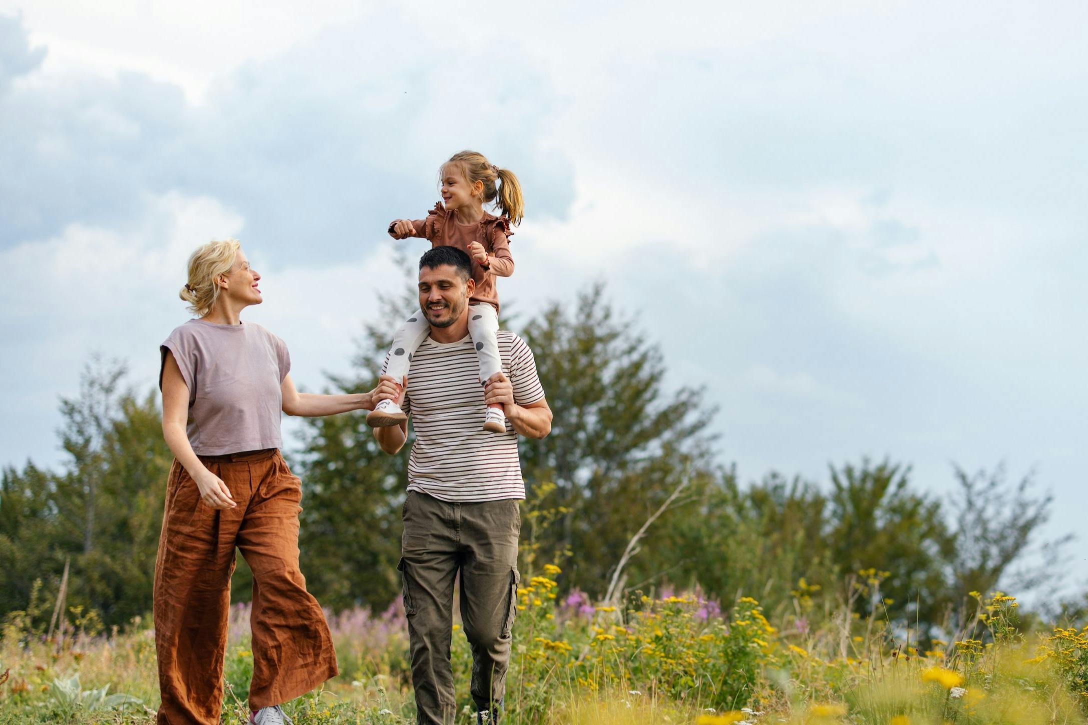 Happy Family Enjoying a Nature Walk