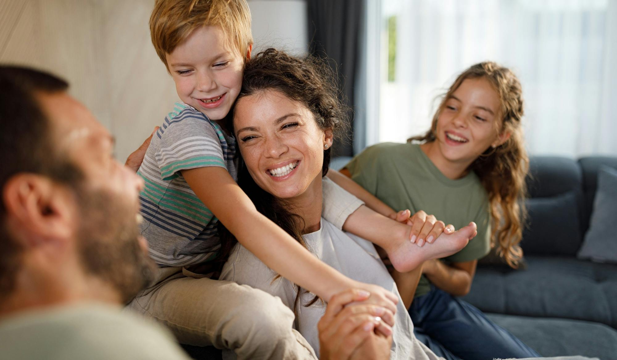 mom smiling with family