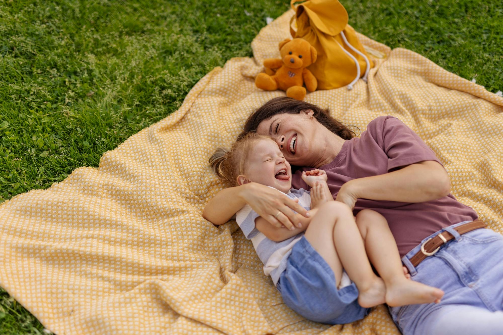 loving cuddle between mother and child