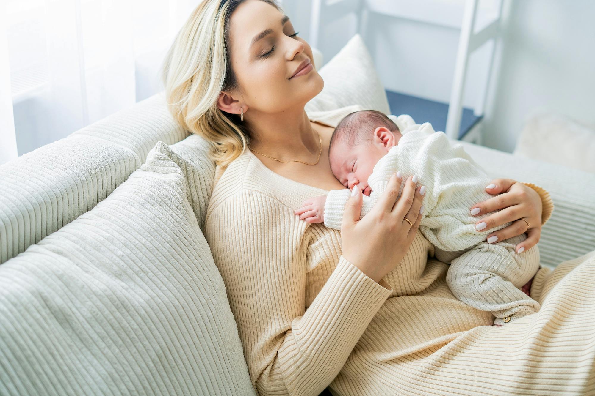 young mom with newborn