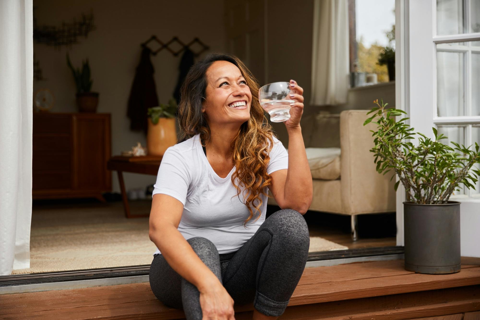 woman smiling on porch