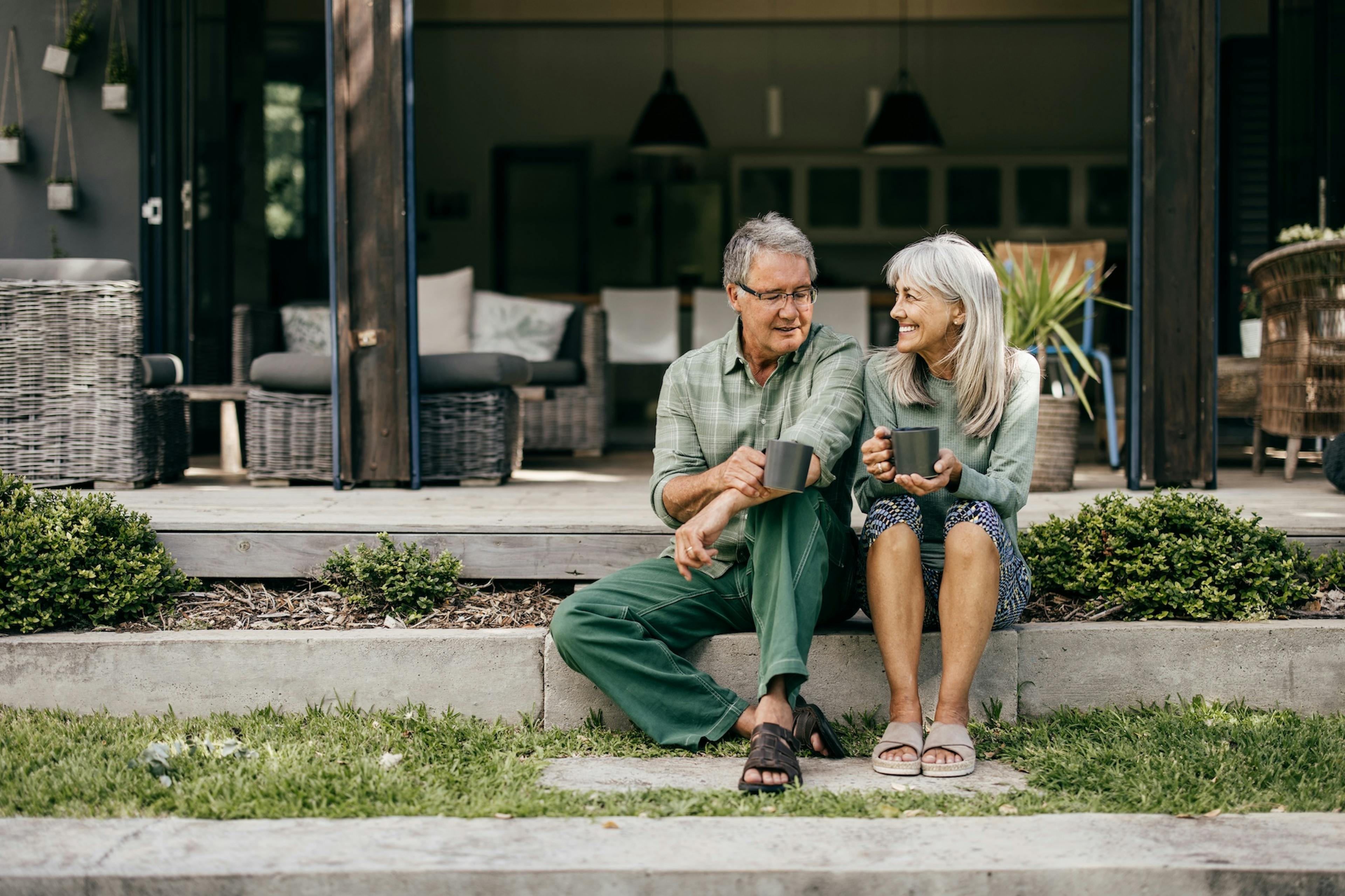 mature couple sitting outside