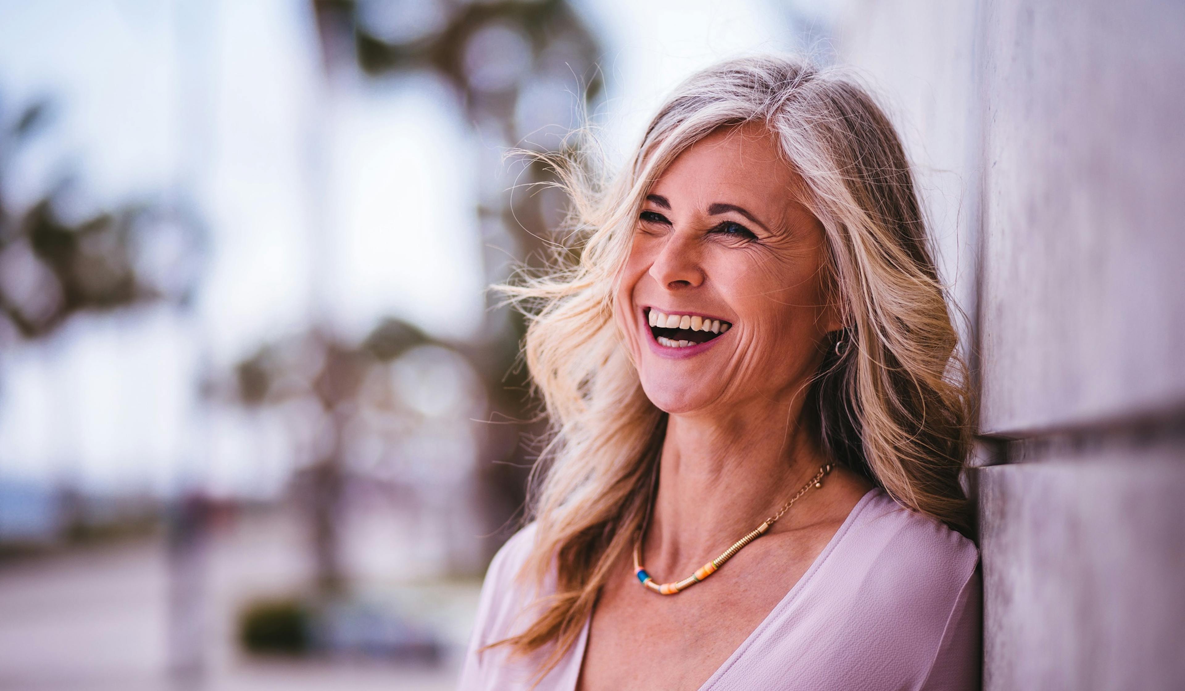 Beautiful stylish senior woman laughing