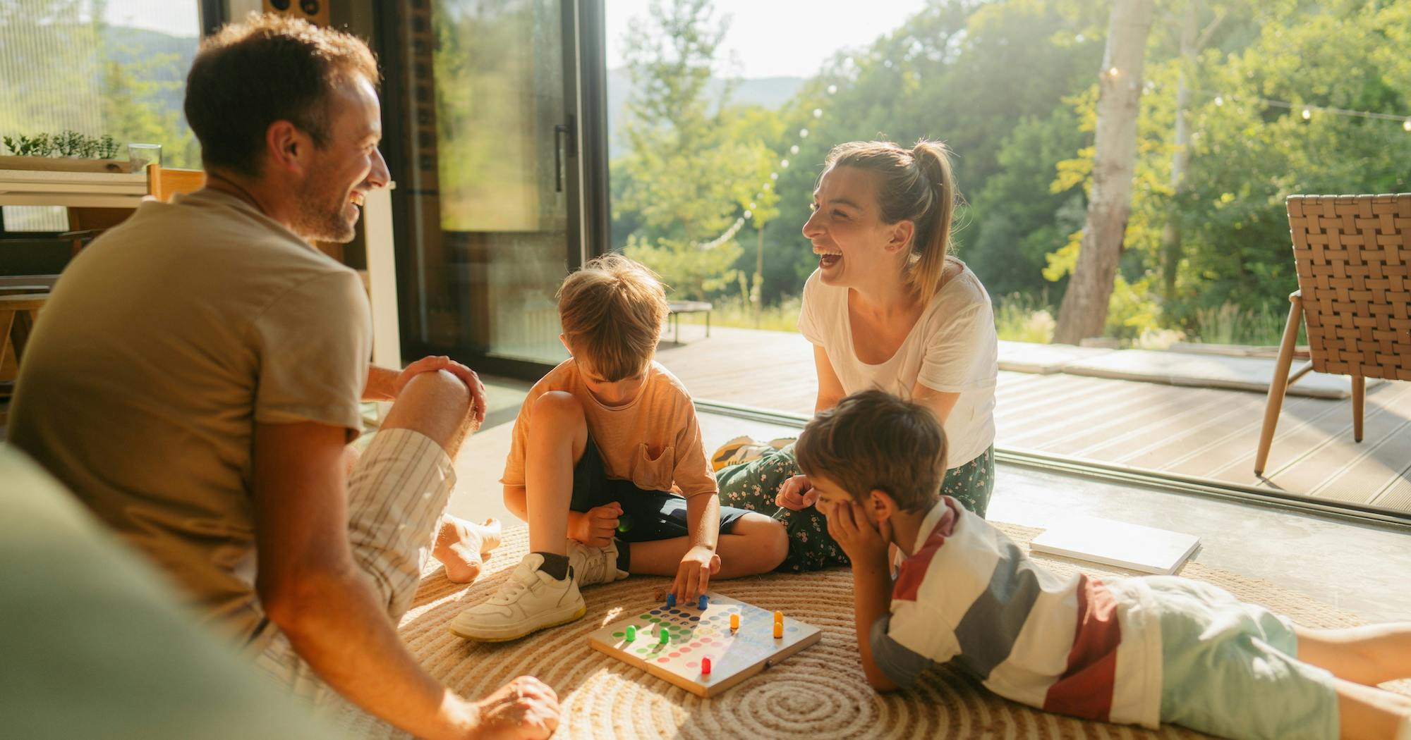 Family playing boardgames together