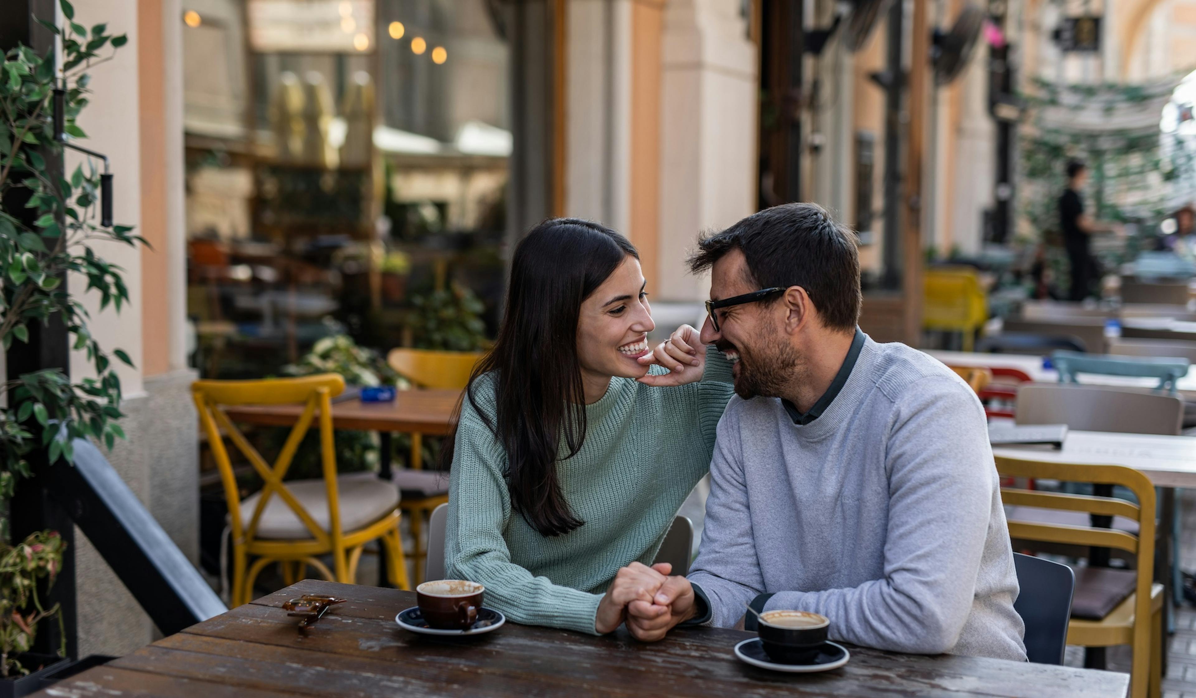 happy couple at a cafe