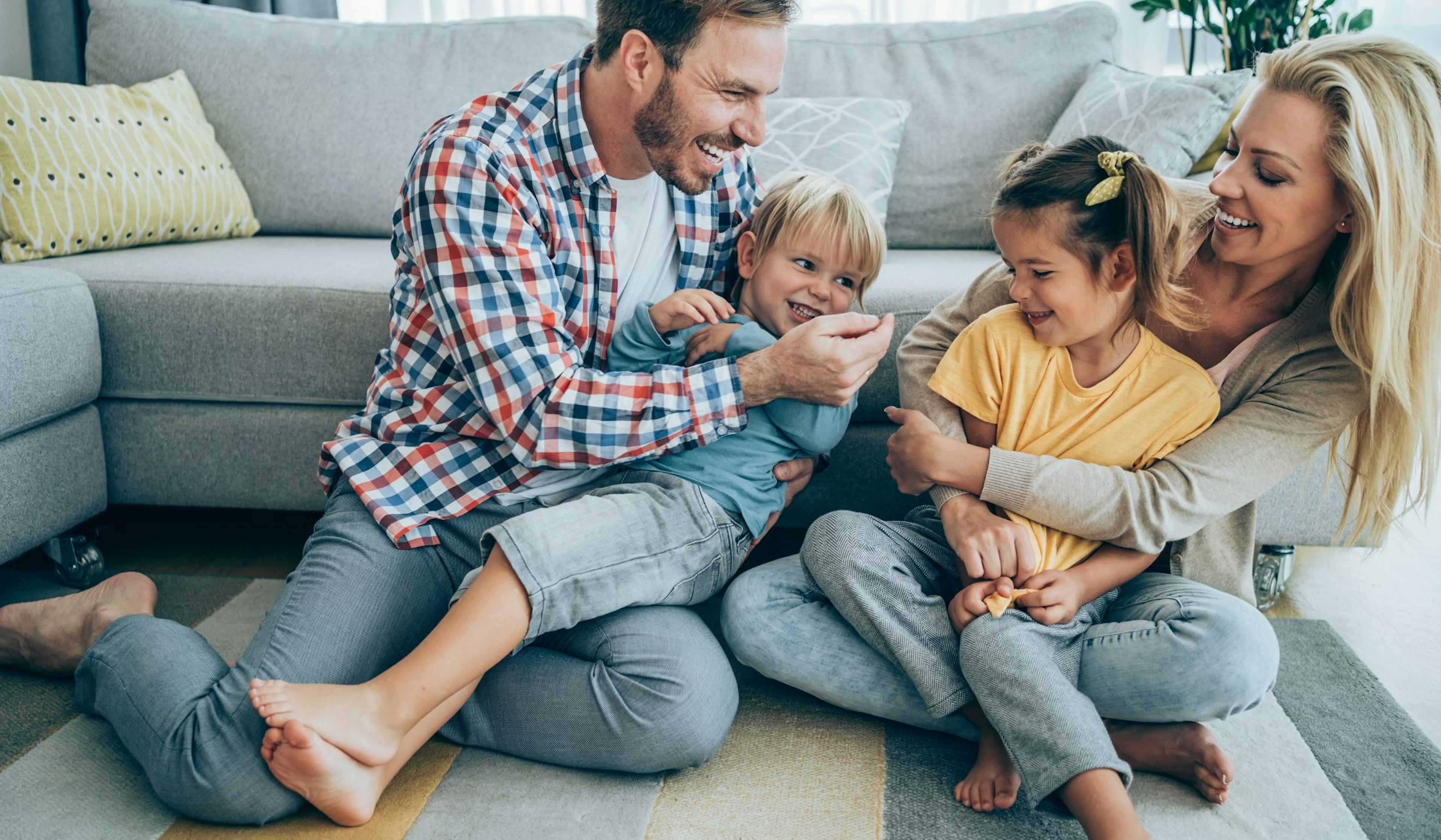 happy family at home playing