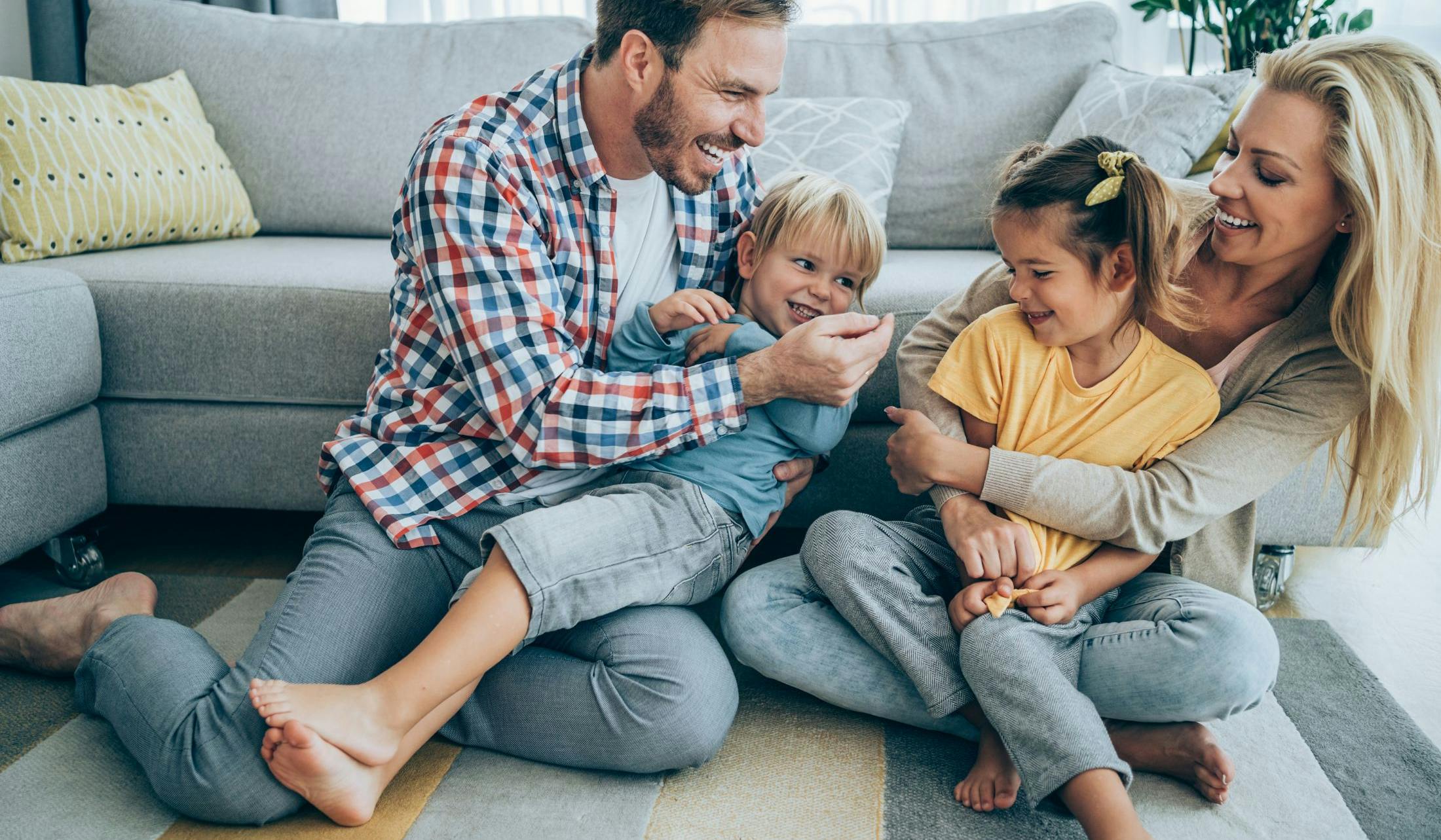 happy family at home playing