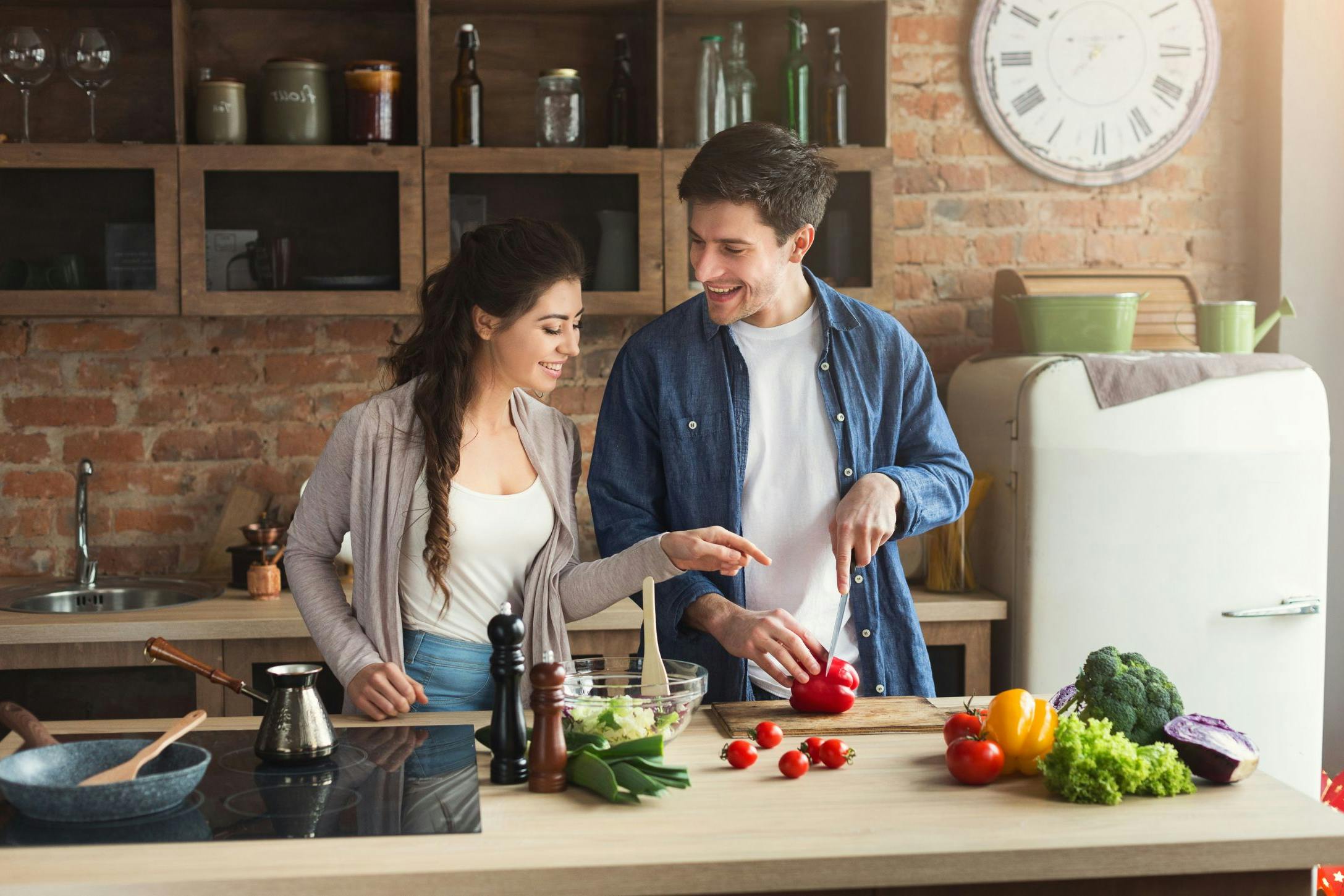 couple cooking together