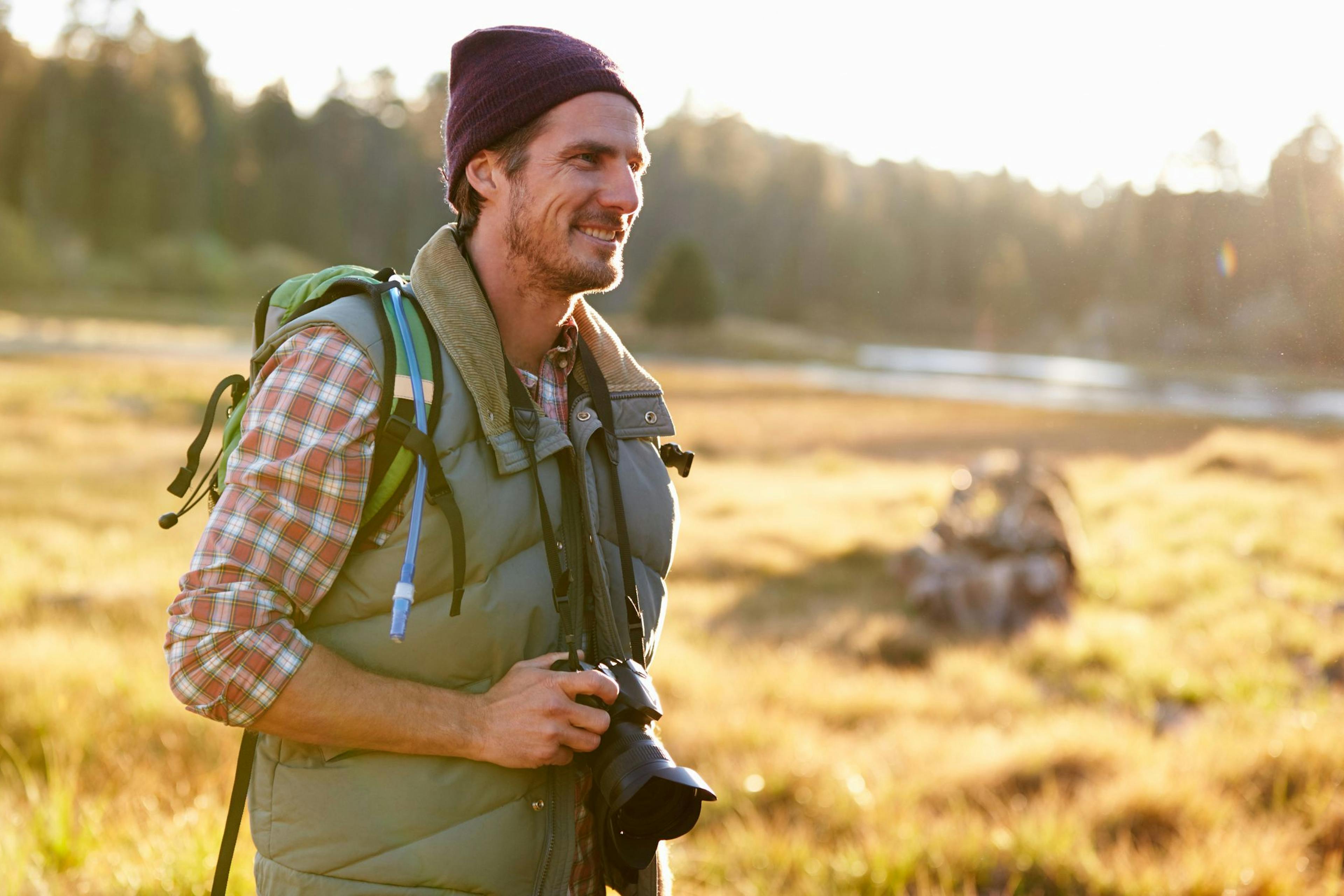 man hiking in the sun