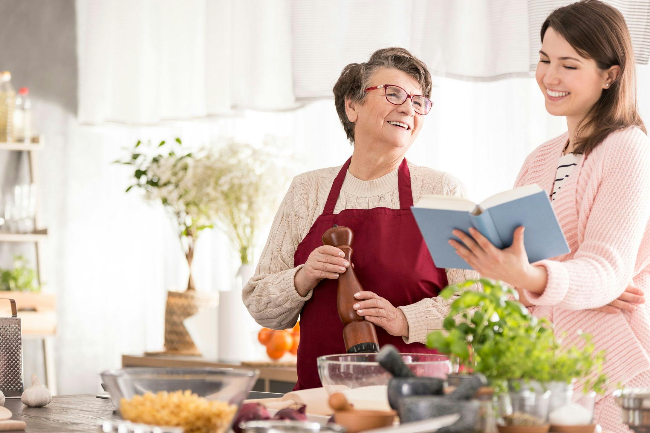mother and daughter cooking