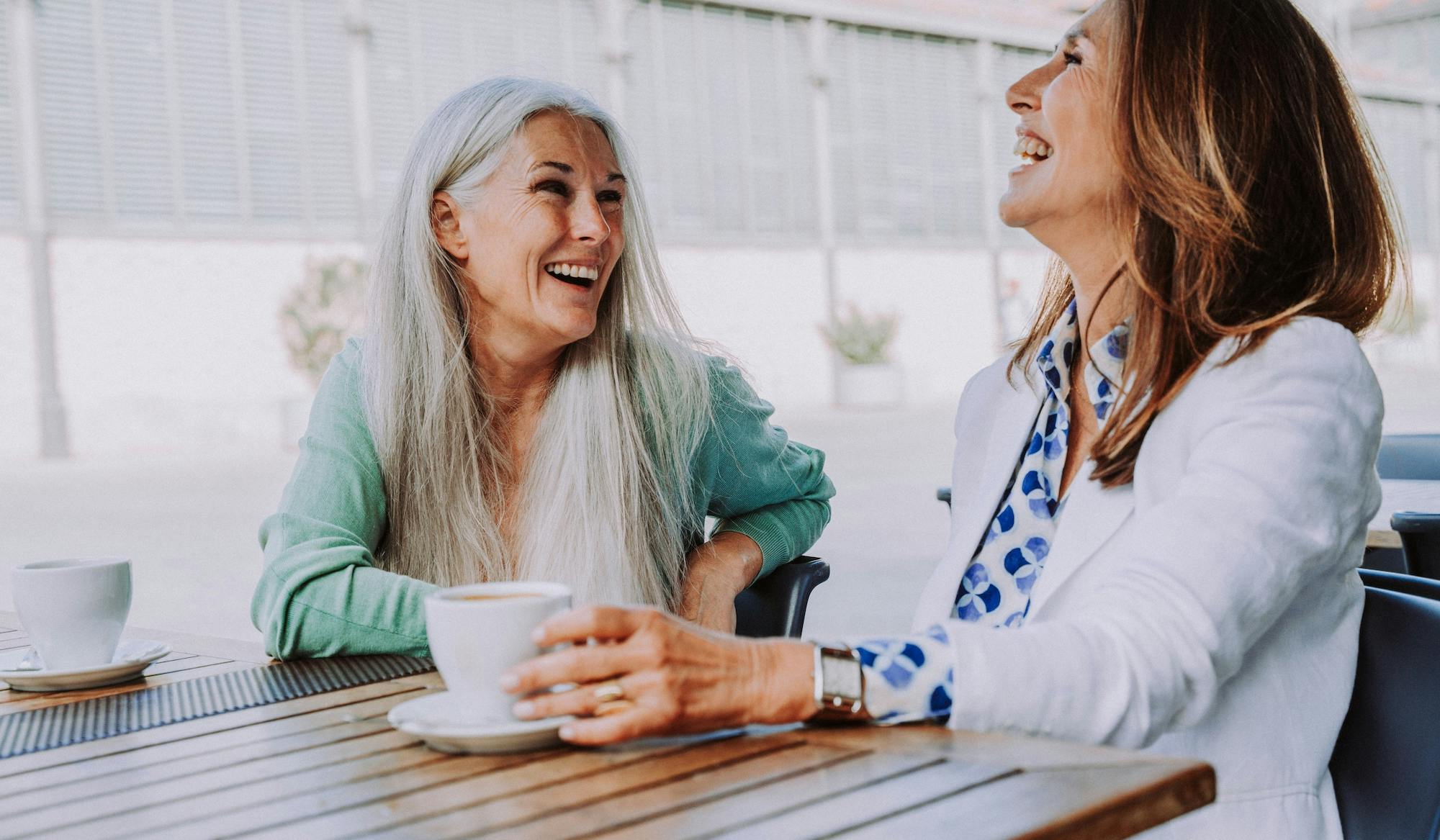 Beautiful senior women meeting outdoors