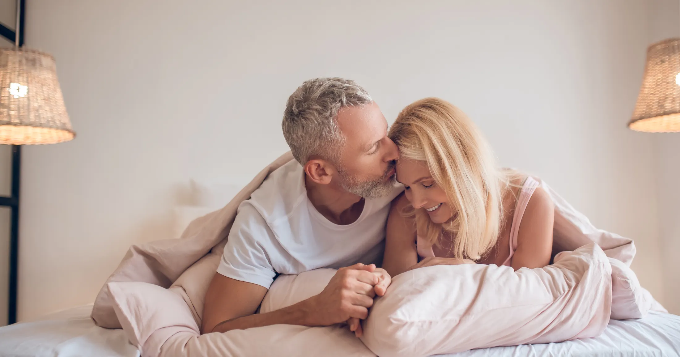 middle age couple in bed