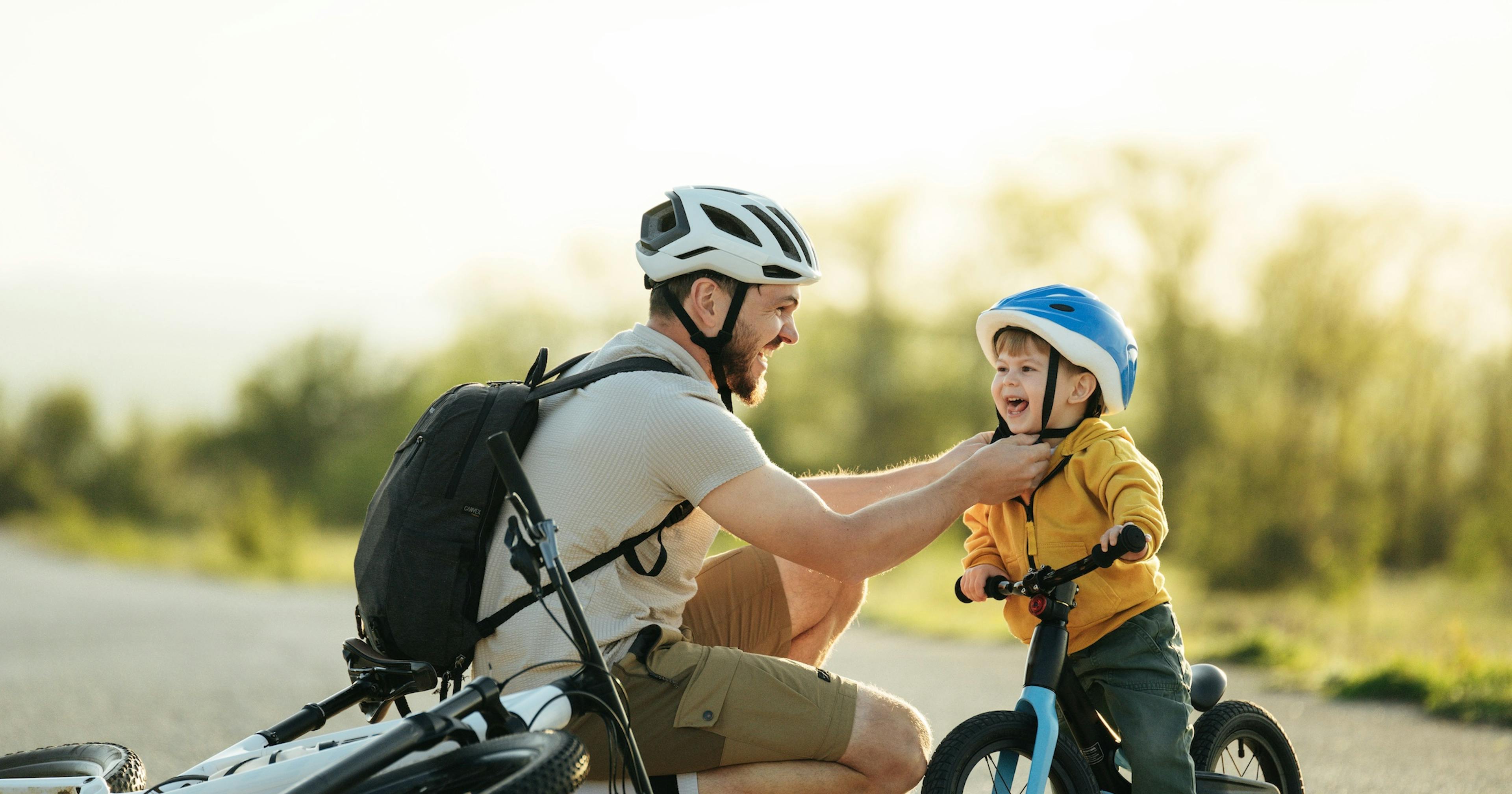 father and son biking