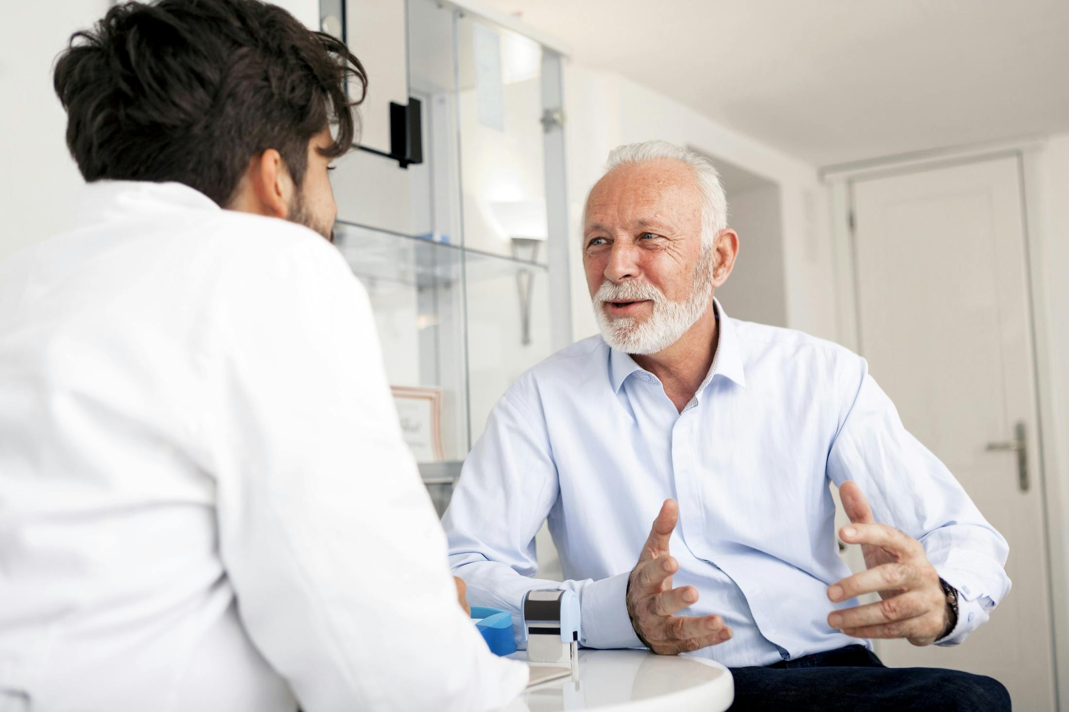 man meeting with a doctor
