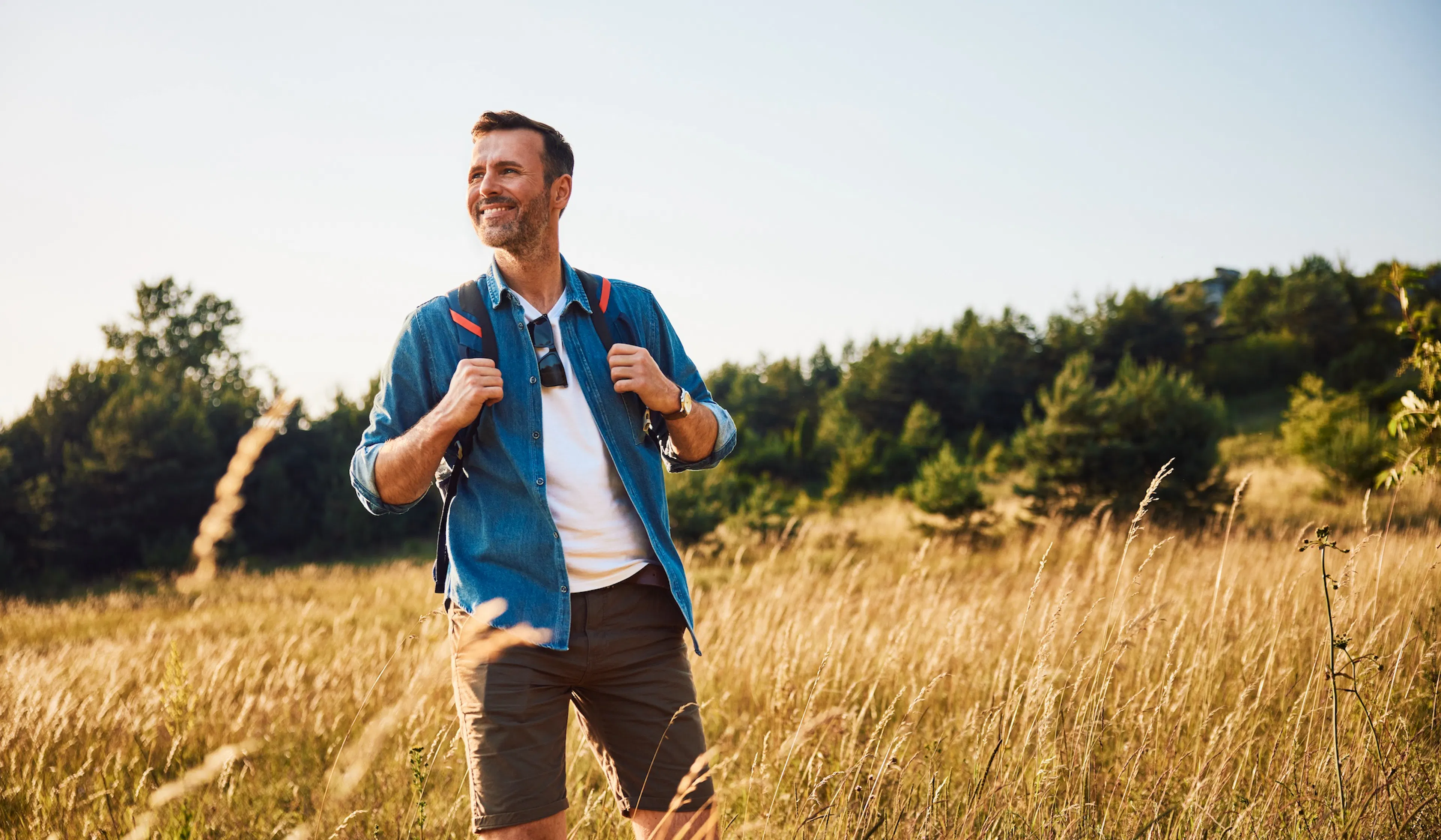 Handsome adult man hiking