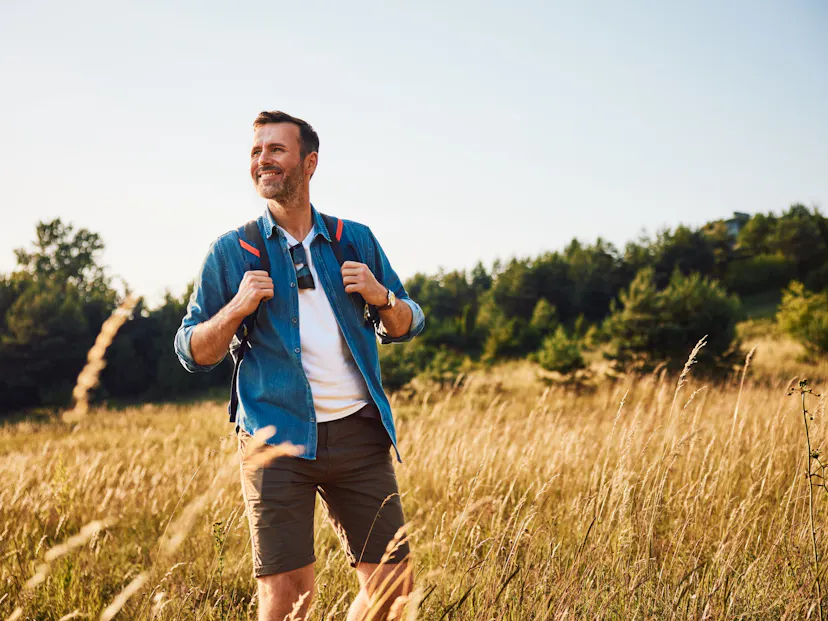 Handsome adult man hiking