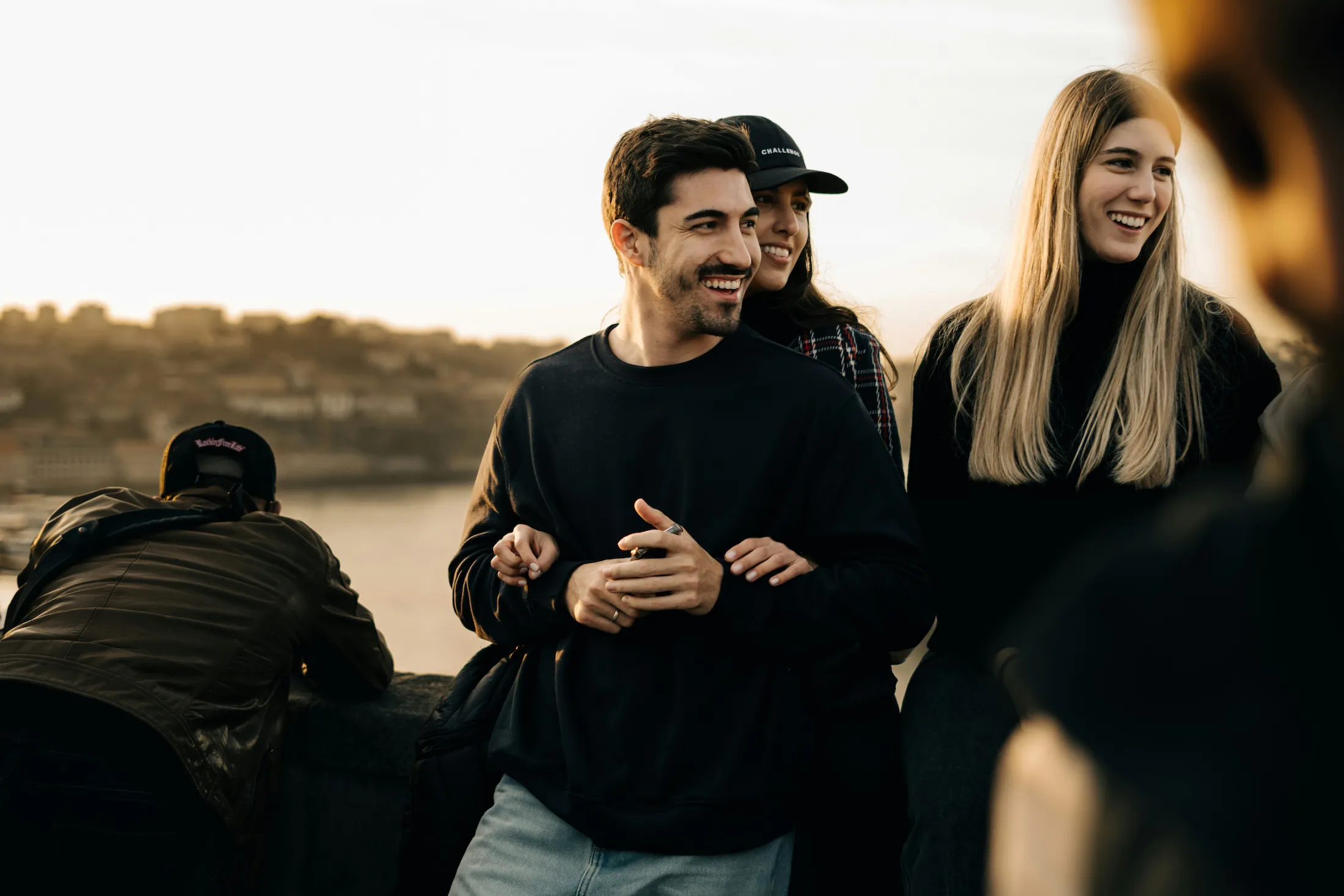friends outside at sunset