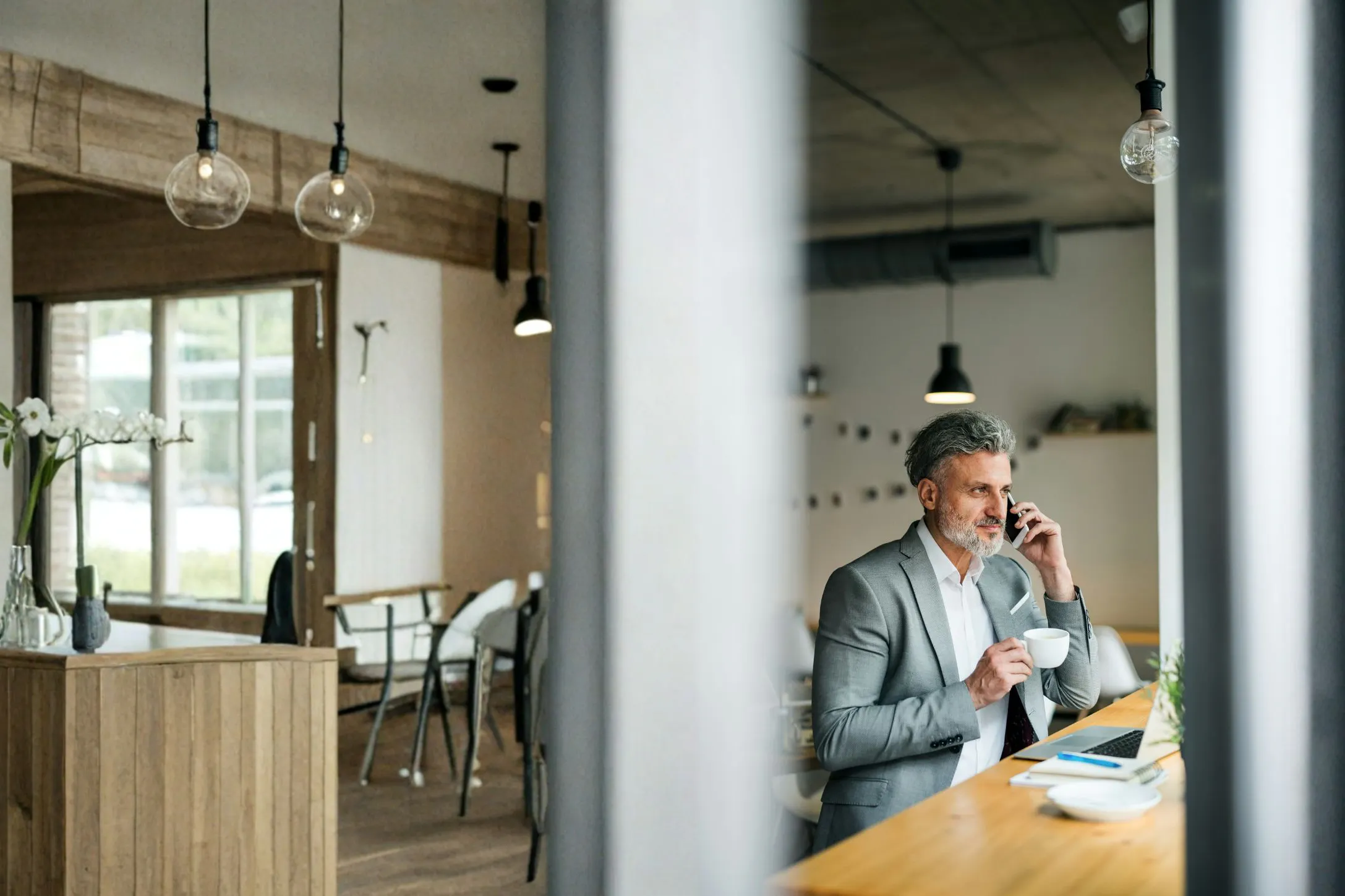 business man working in a cafe