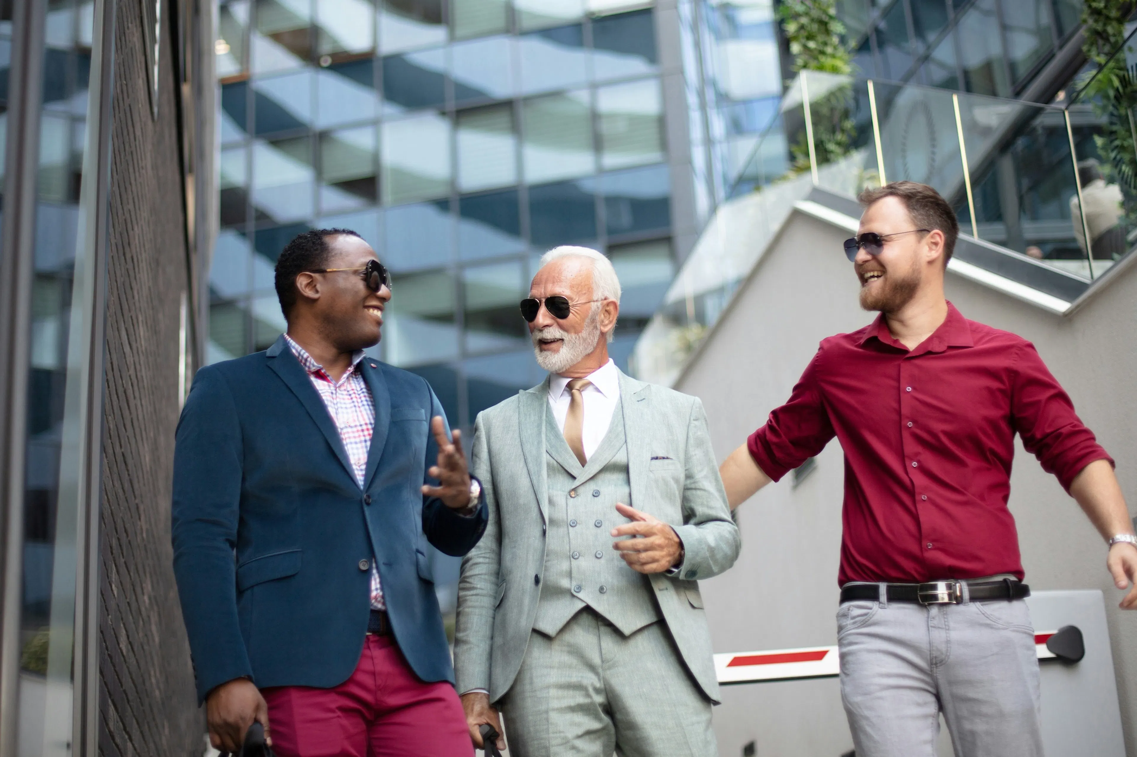 3 business men walking outside