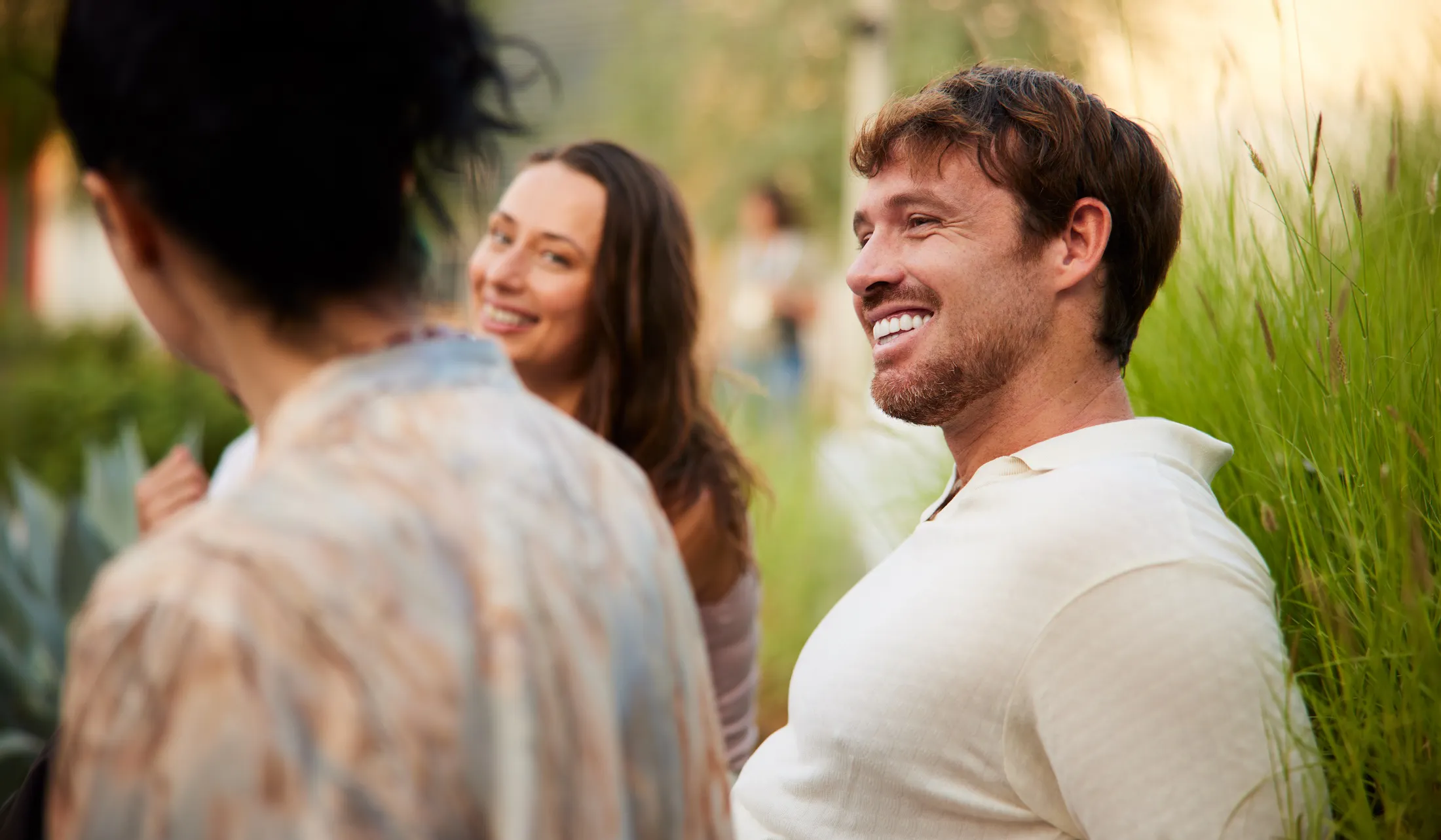 healthy middle age man smiling with friends