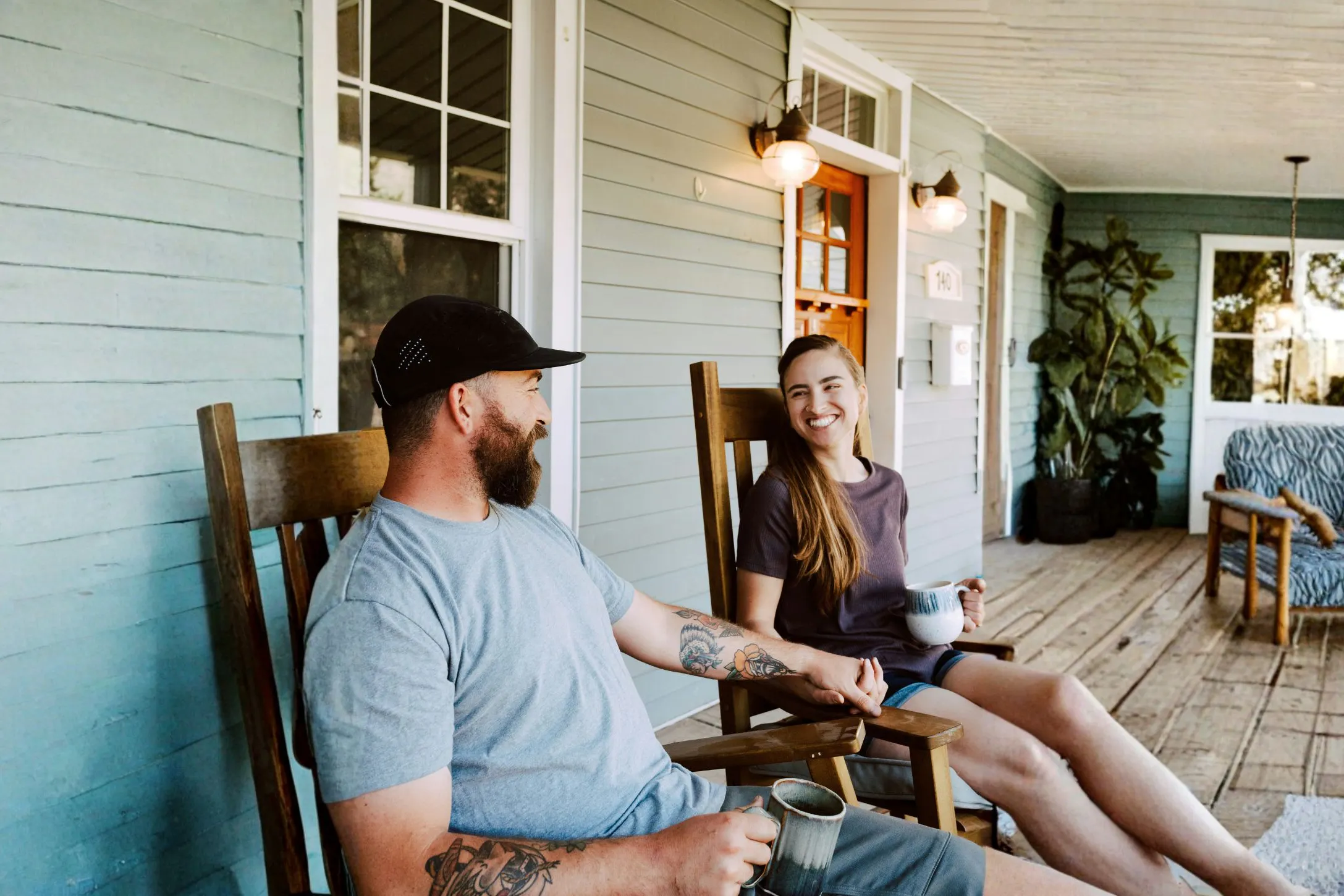 happy couple on a porch