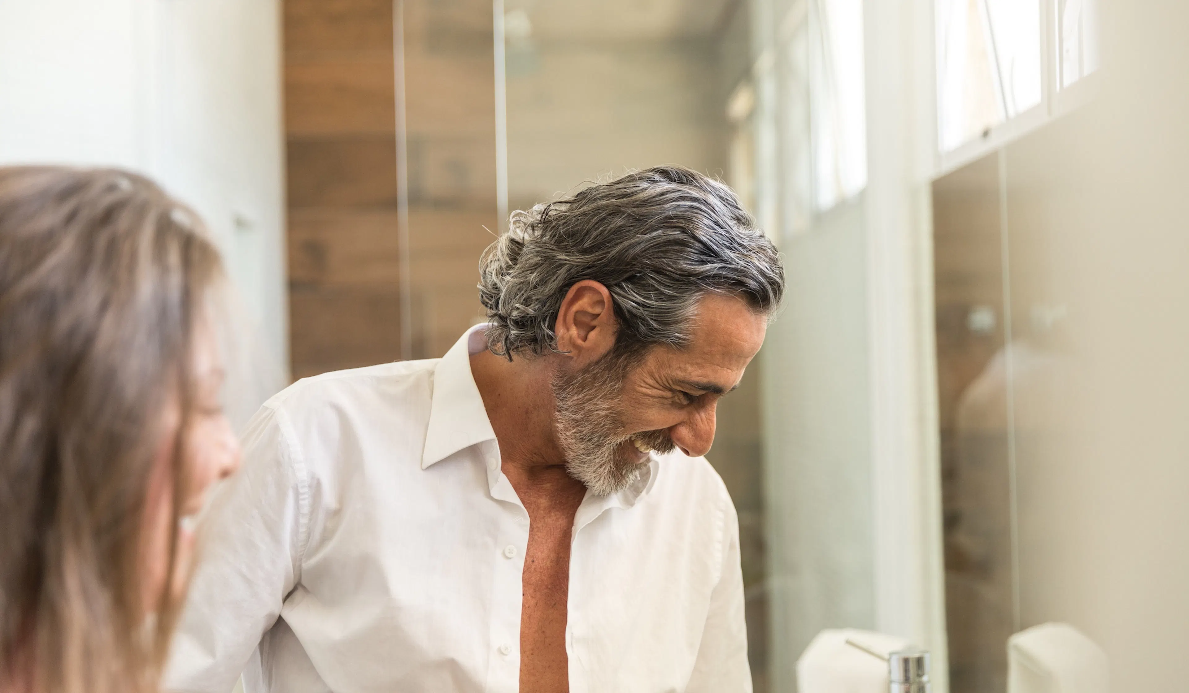 Mature Couple in The Bathroom Getting Ready