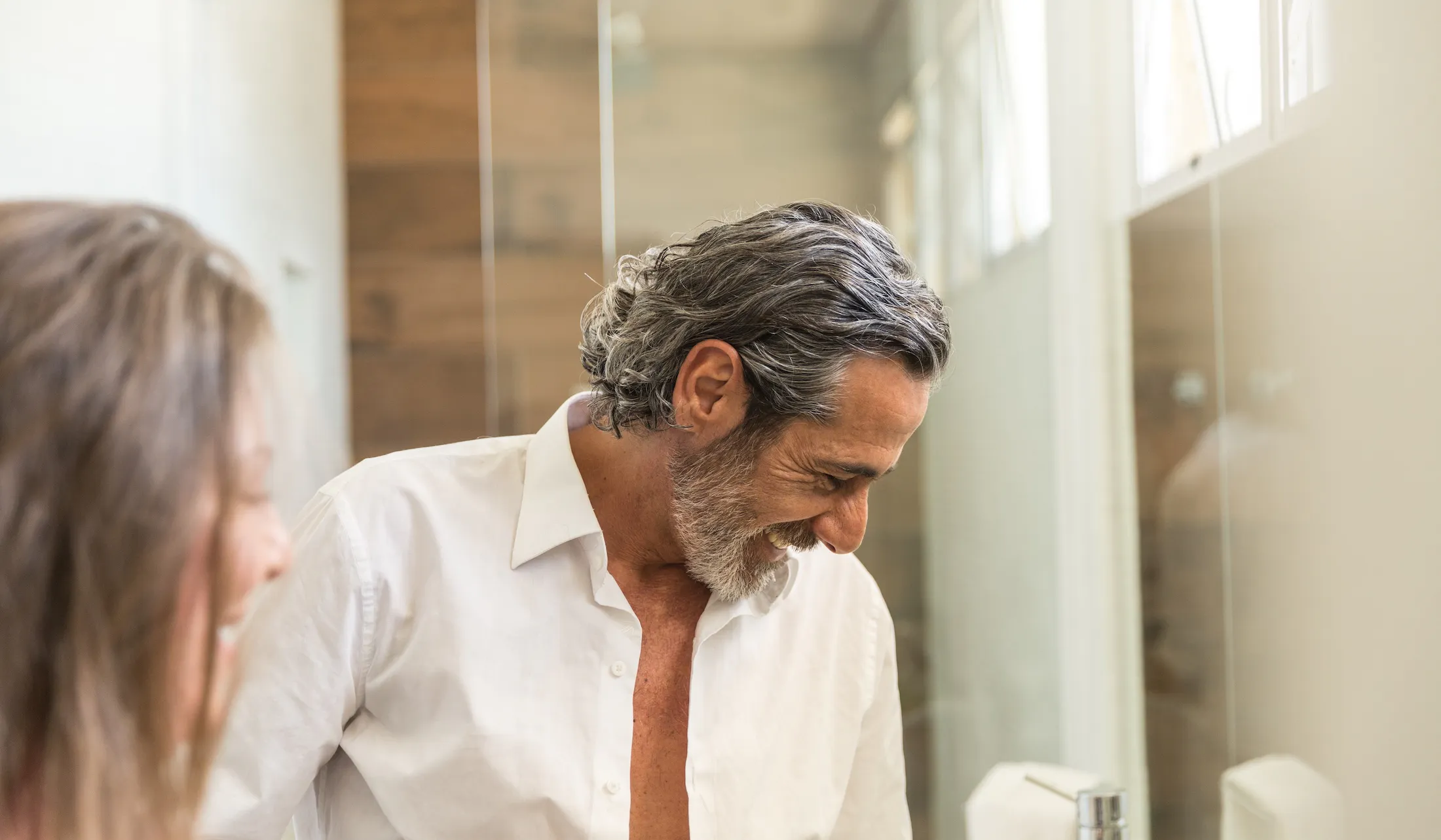 Mature Couple in The Bathroom Getting Ready