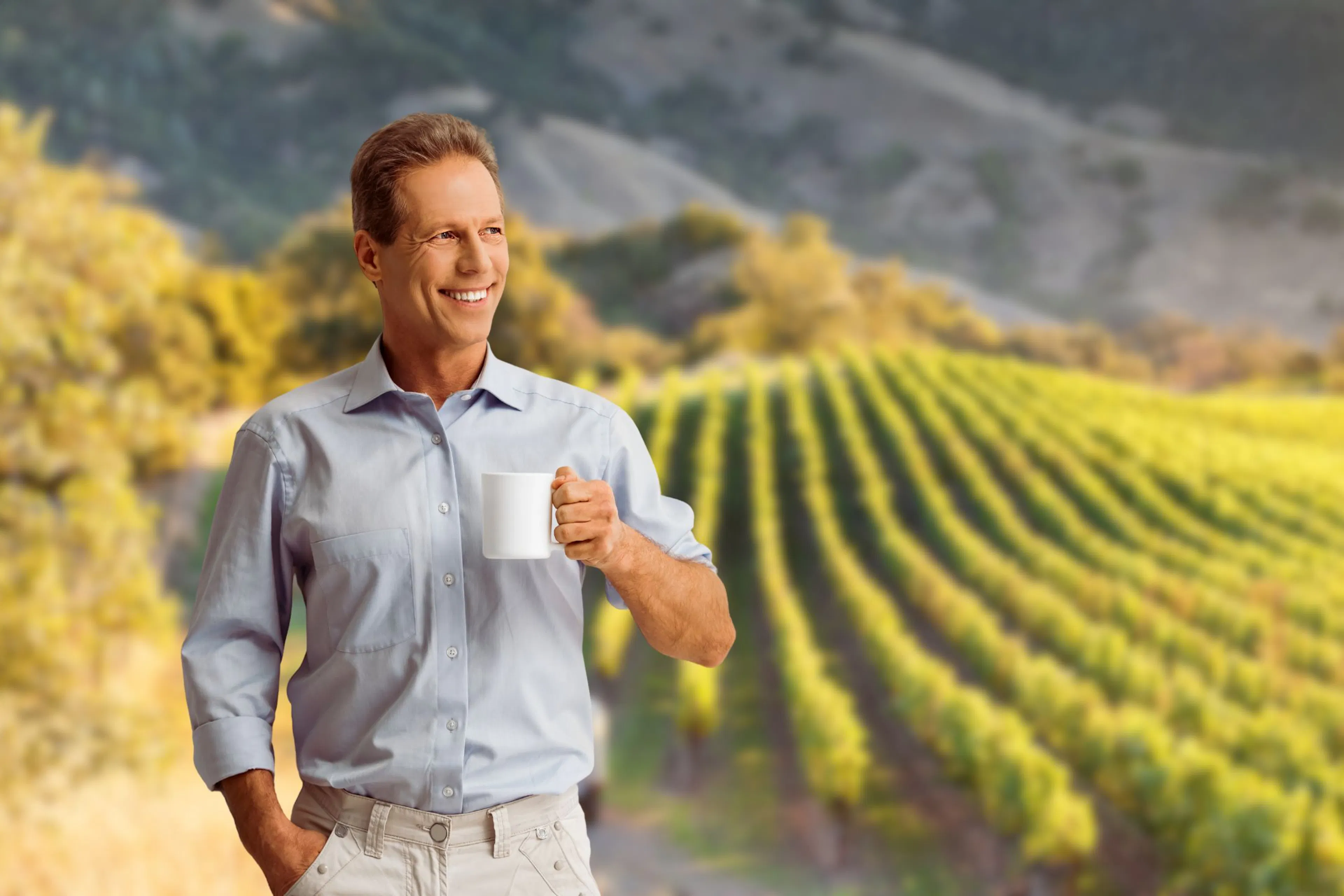Man drinking coffee in the sunshine 