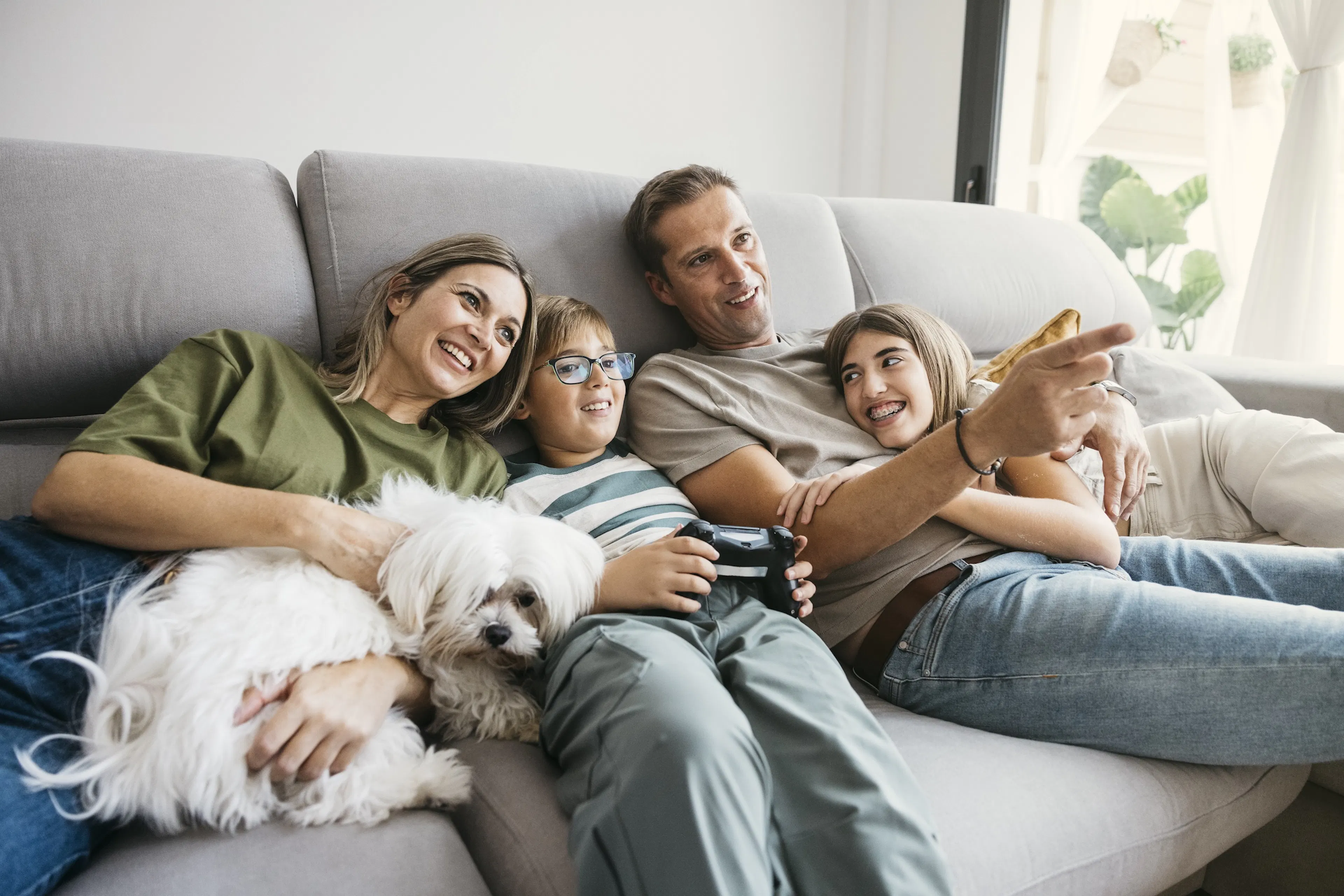 Family relaxing on couch