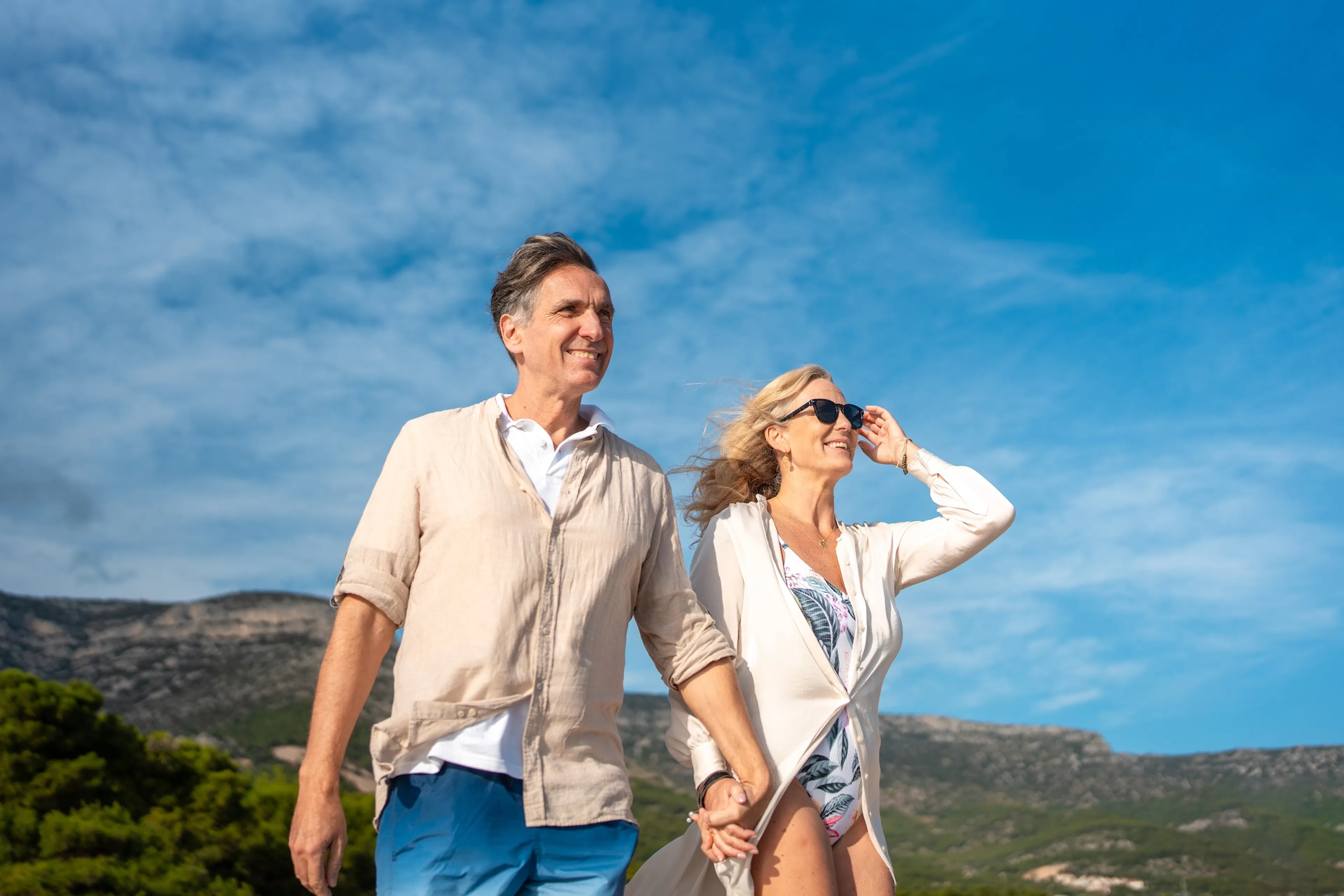 Mature Couple Walking Along Croatian Coast