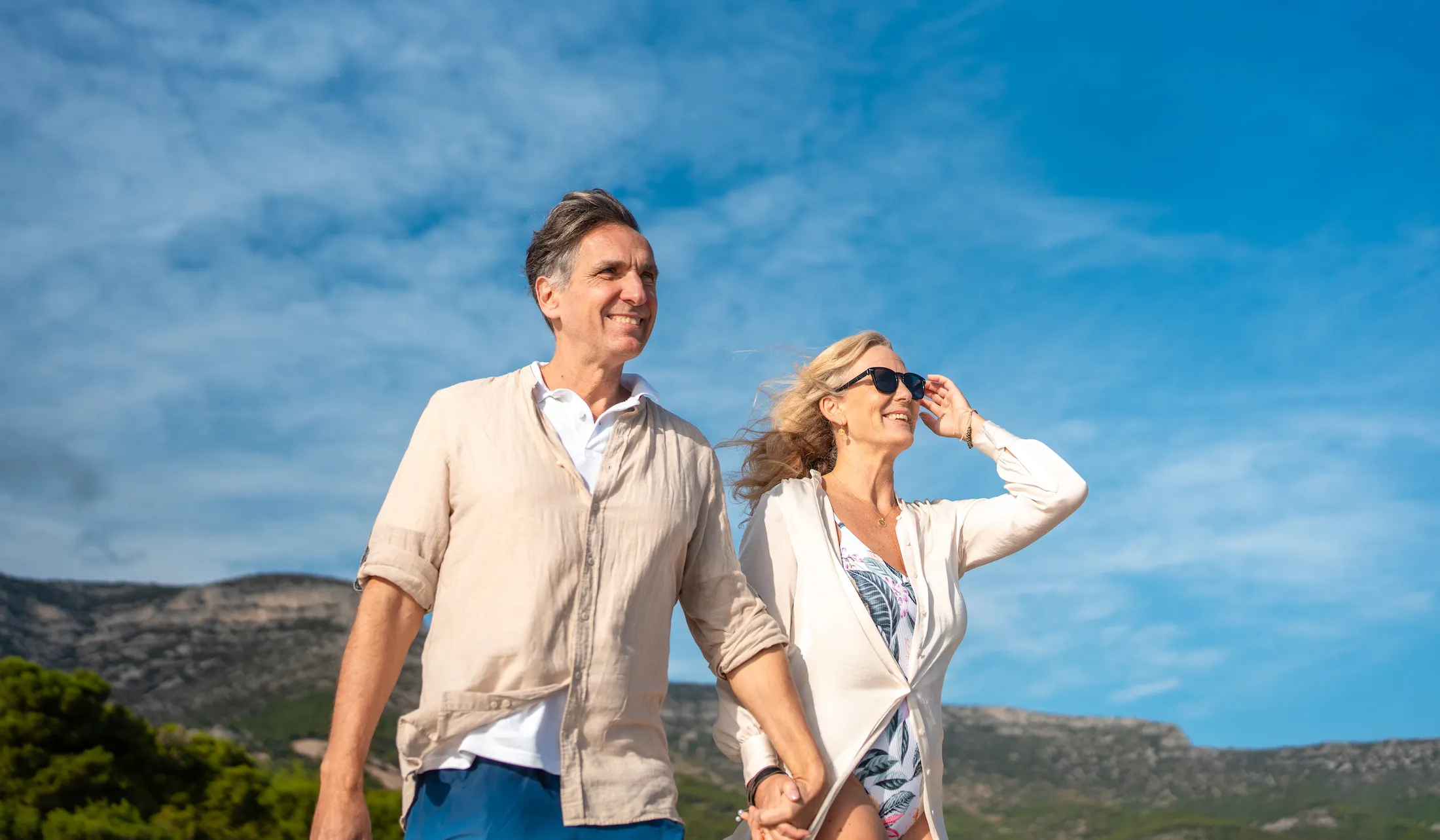 Mature Couple Walking Along Croatian Coast