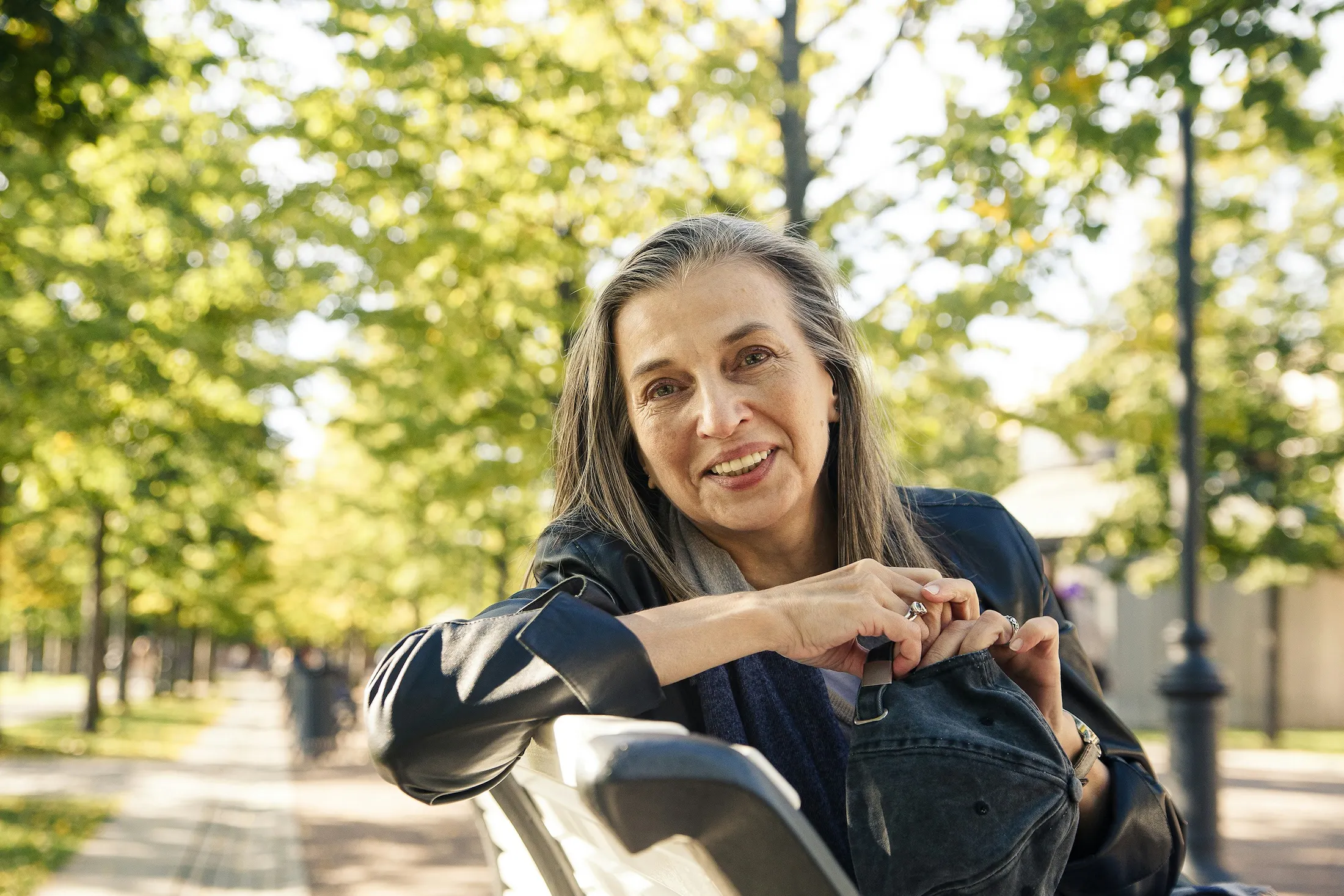 beautiful middle age woman in a park