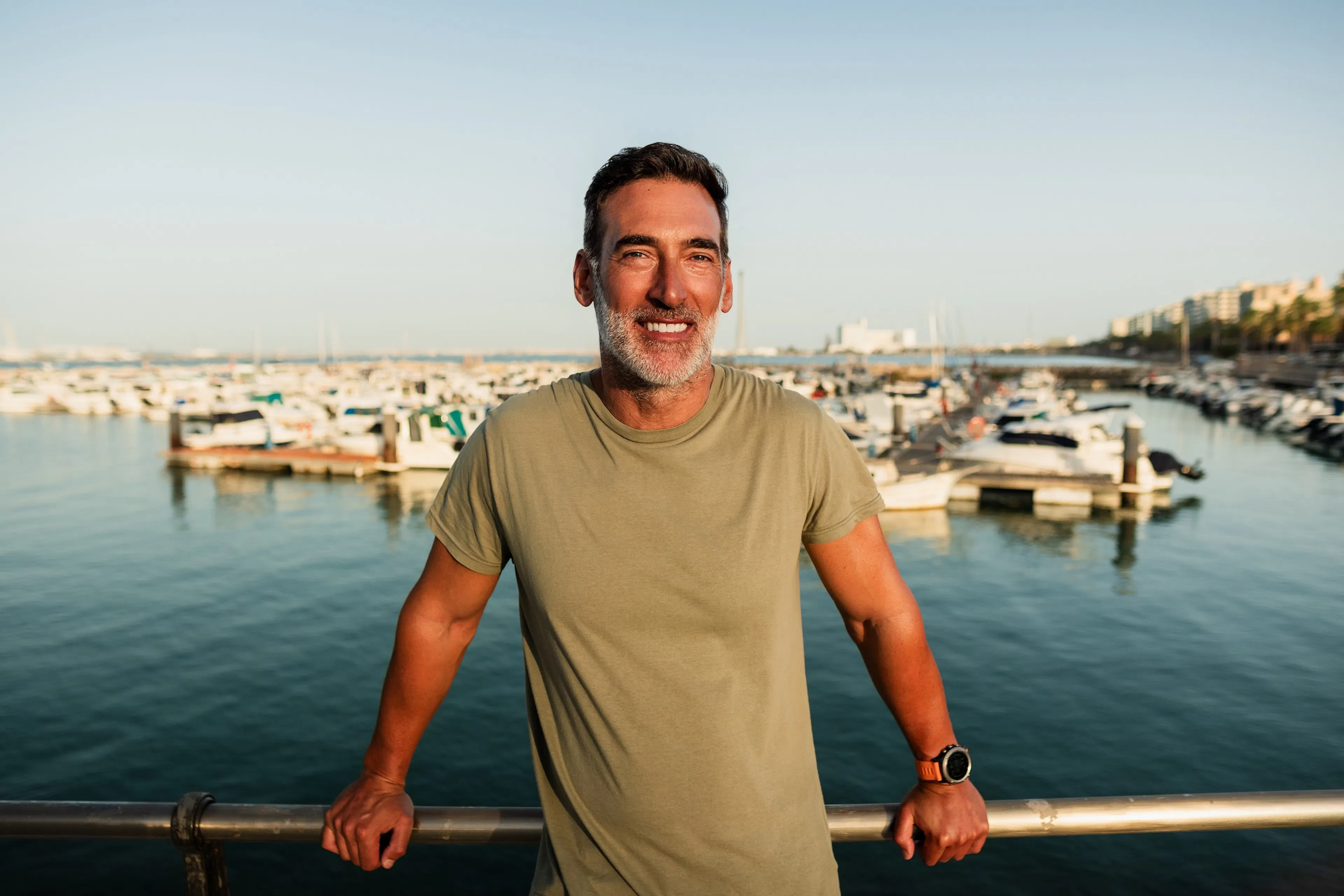 Mature man with a beard smiling
