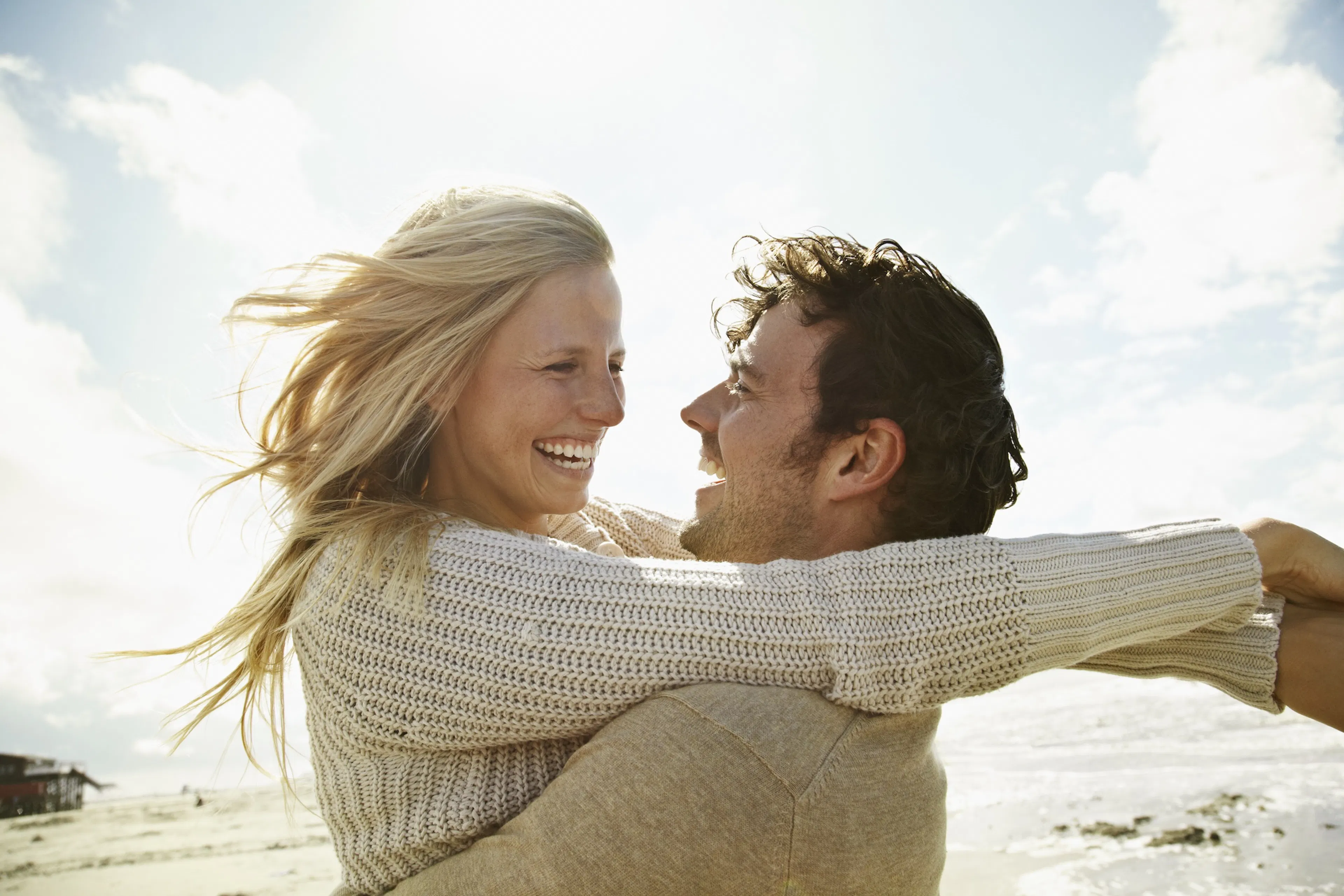 couple embracing on the beach