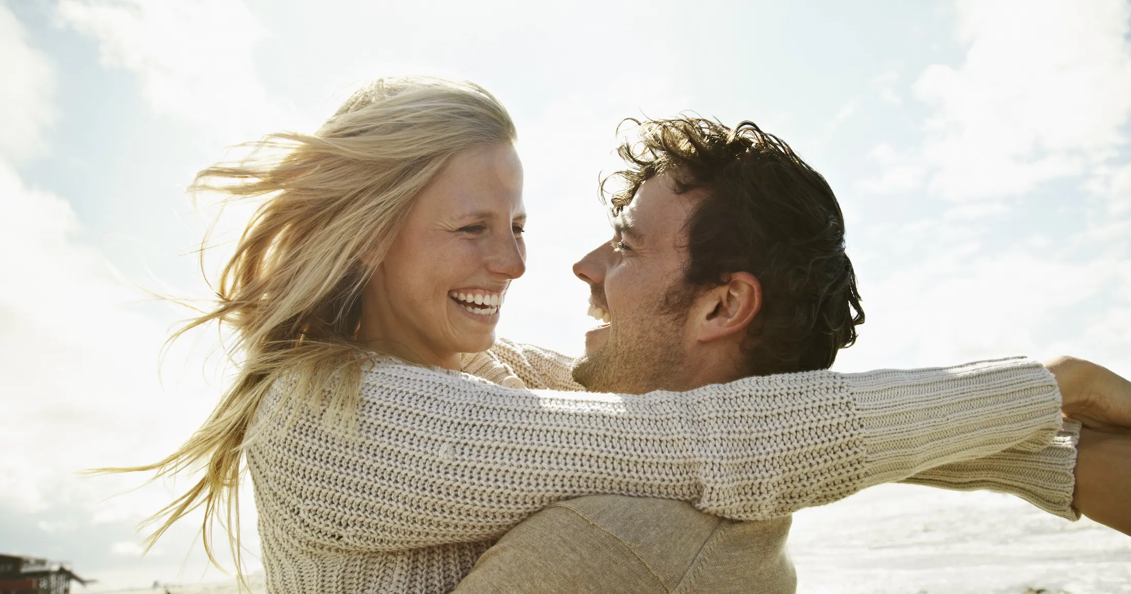 couple embracing on the beach