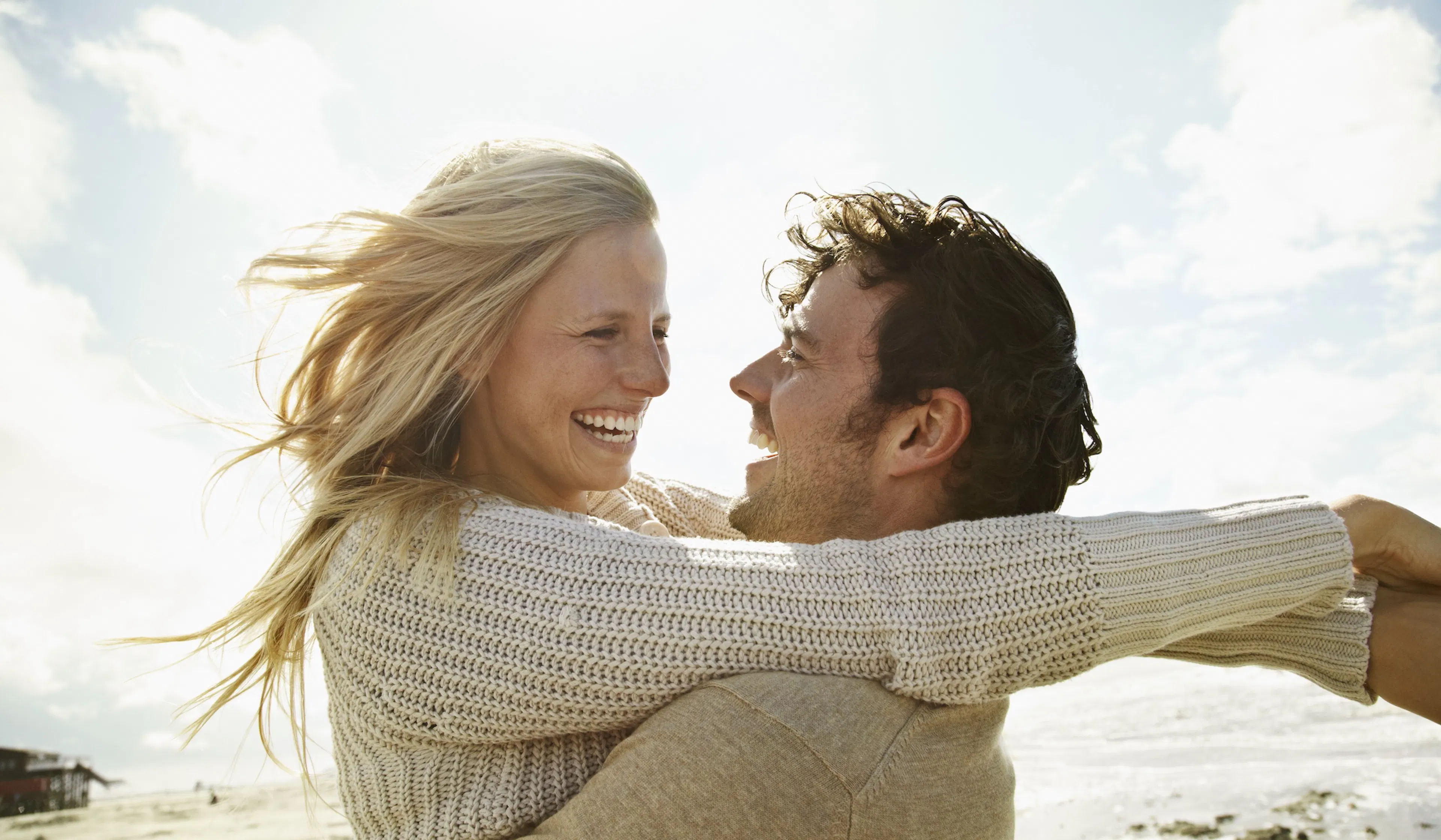couple embracing on the beach