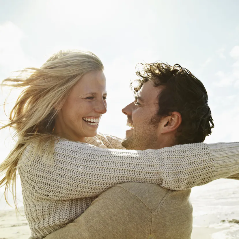 couple embracing on the beach