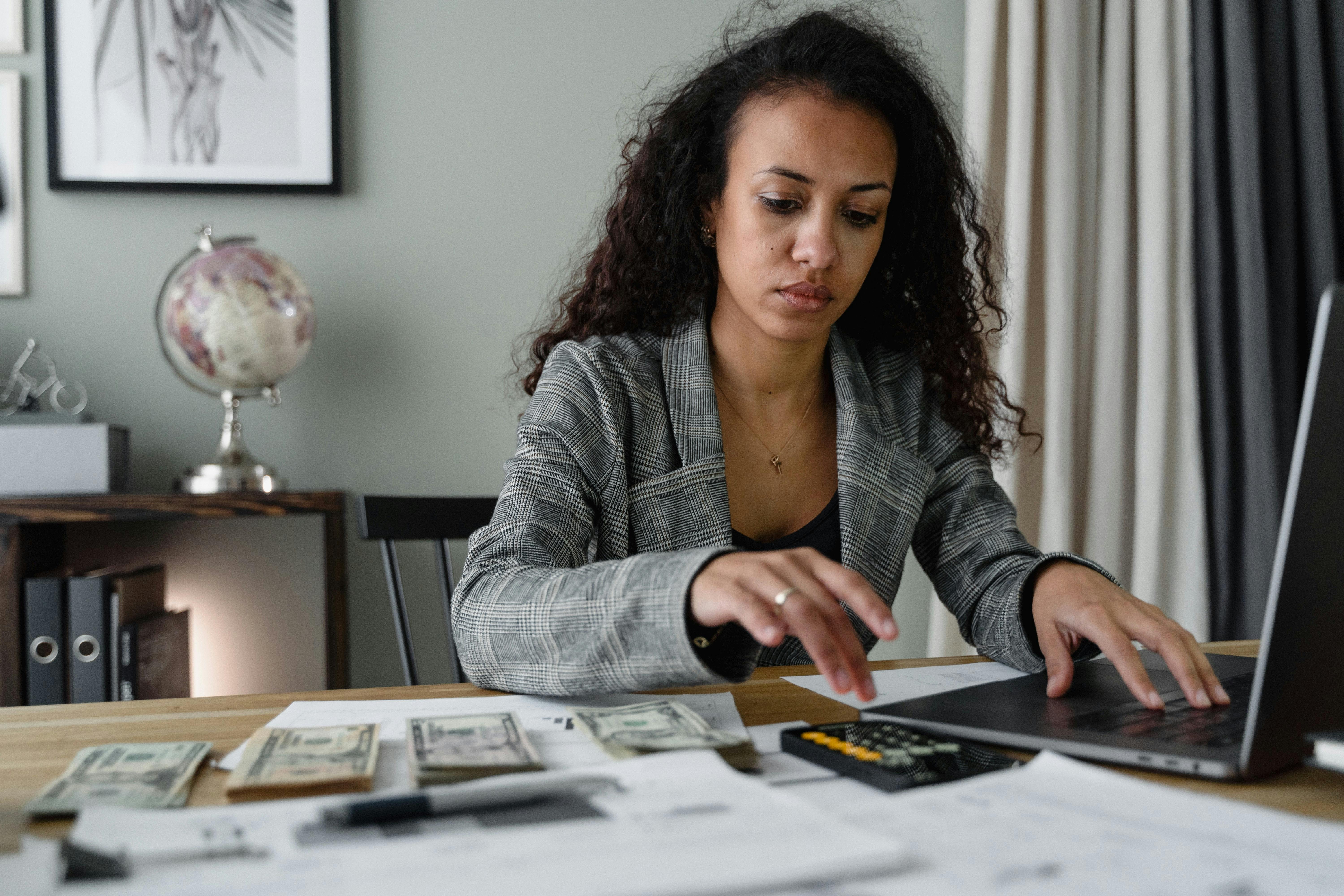 Woman Calculating Interest