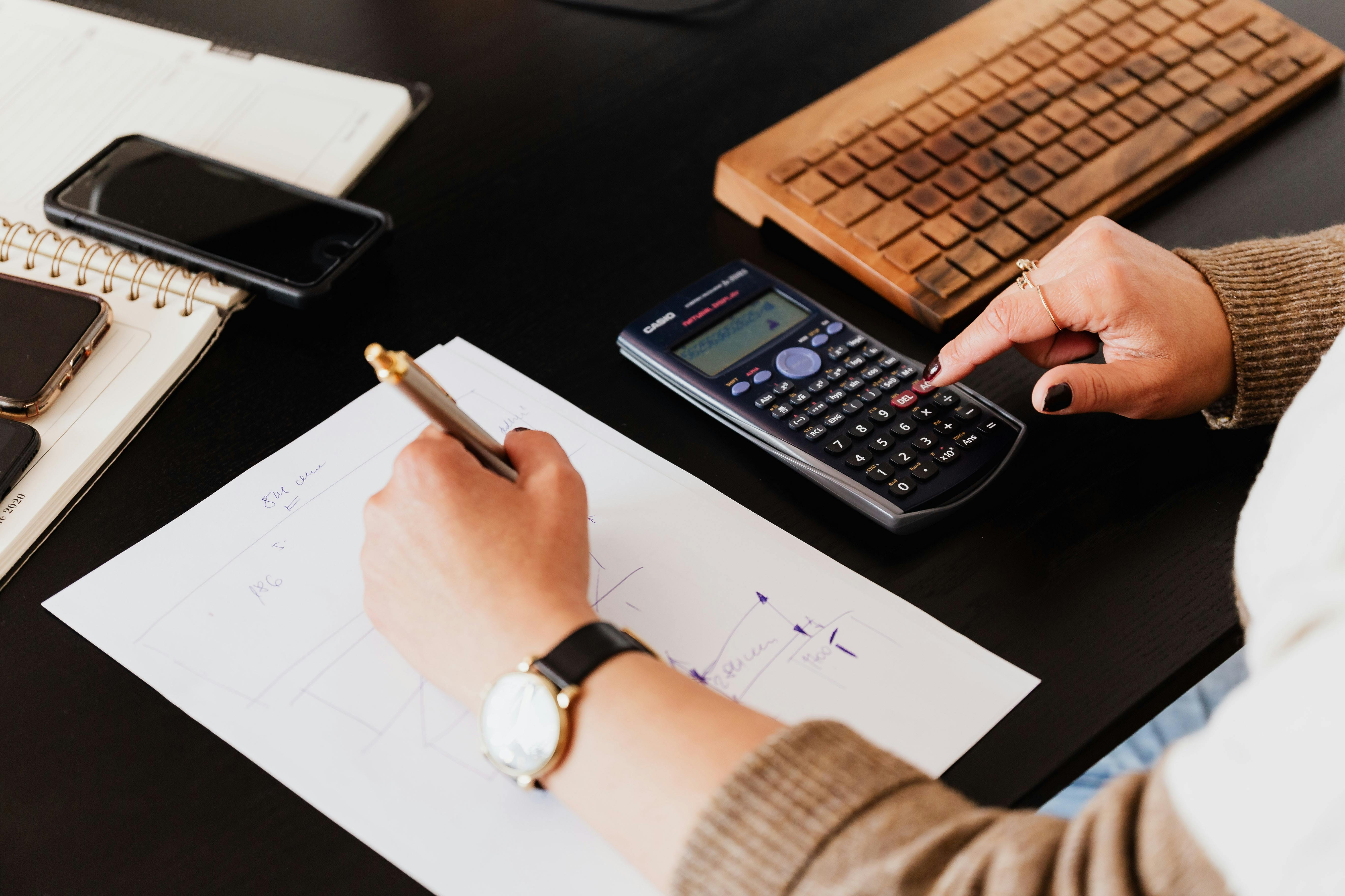 Accountant using calculator