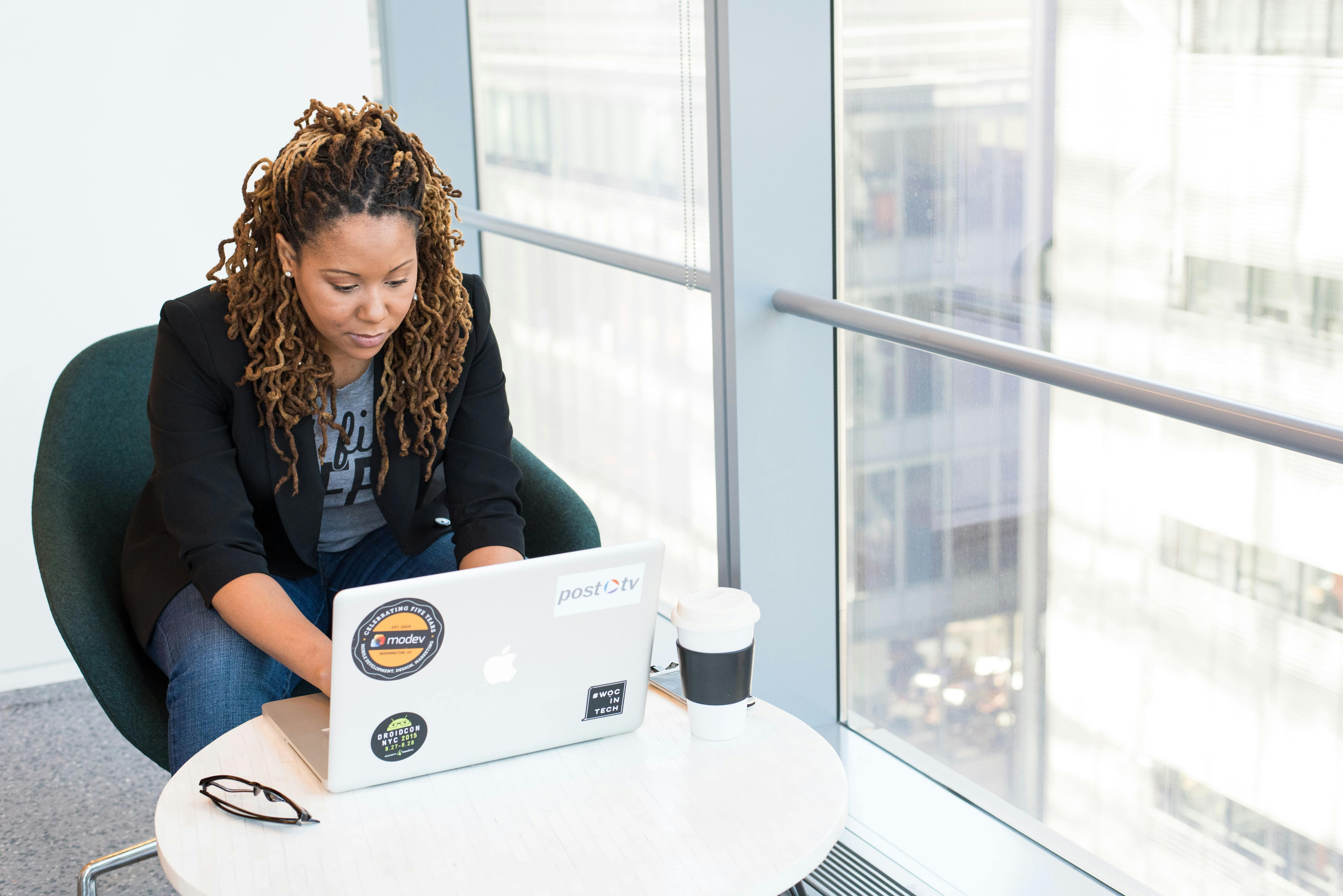 Woman entrepreneur with laptop