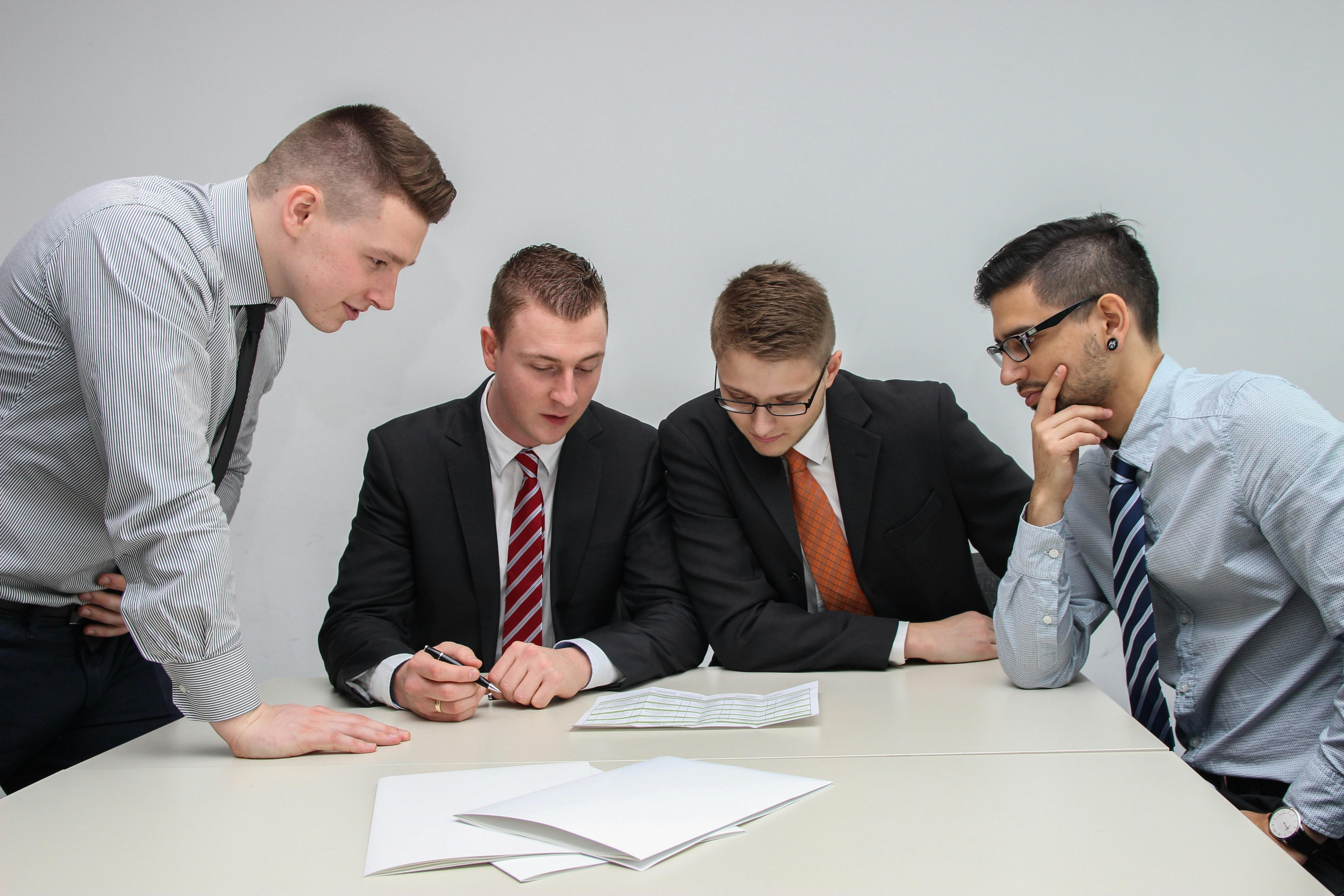 4 bankers in suits