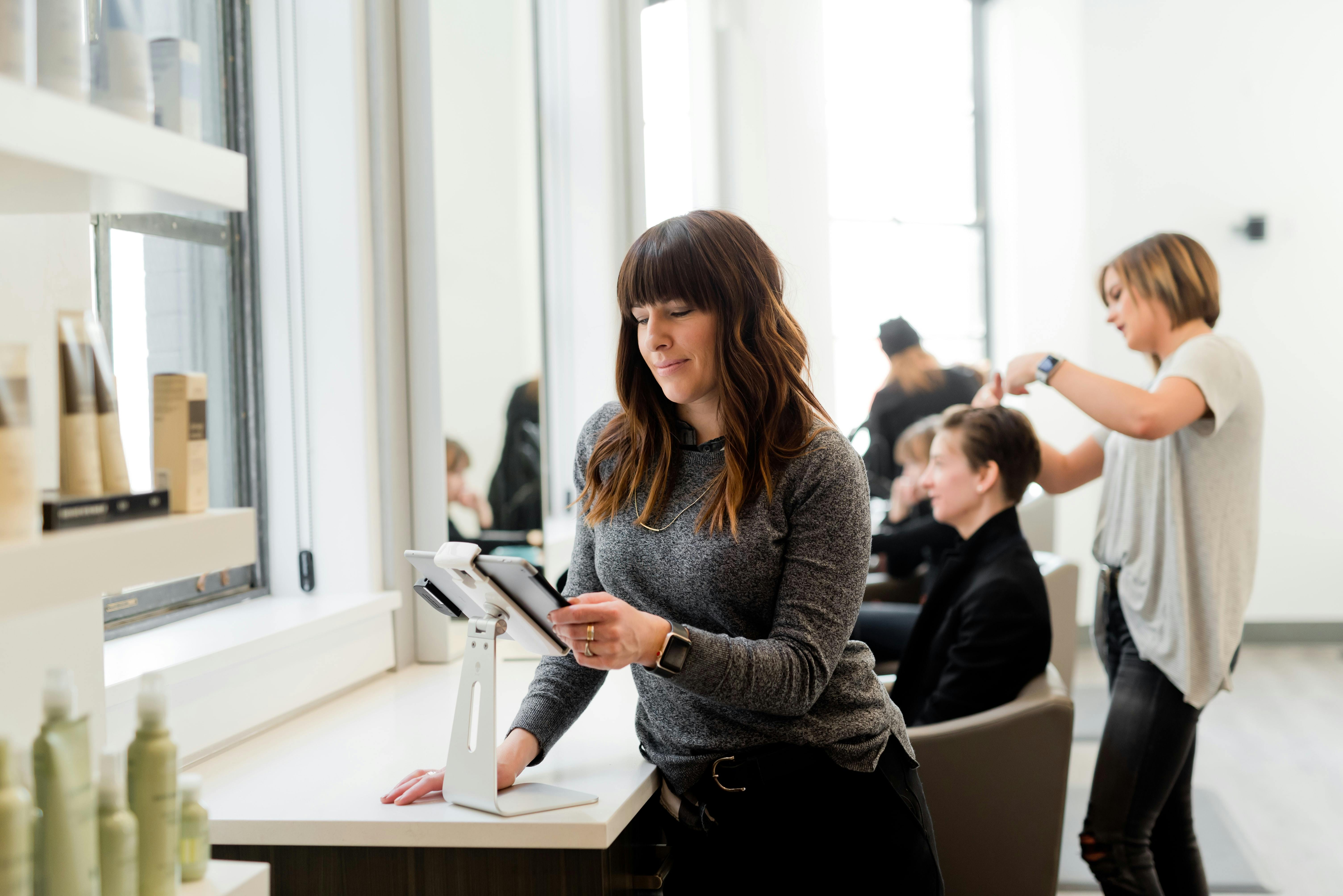 Female boss looking at phone