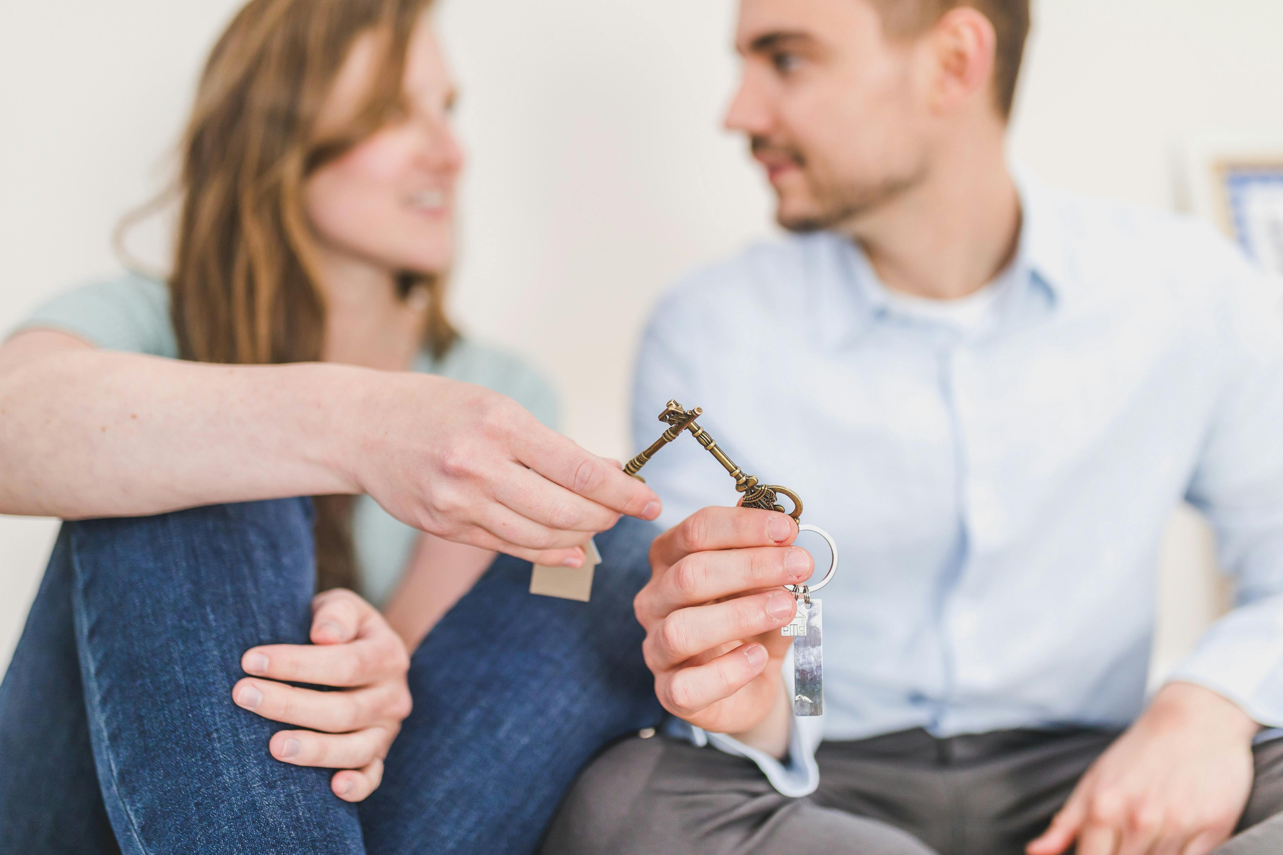 Couple holding keys